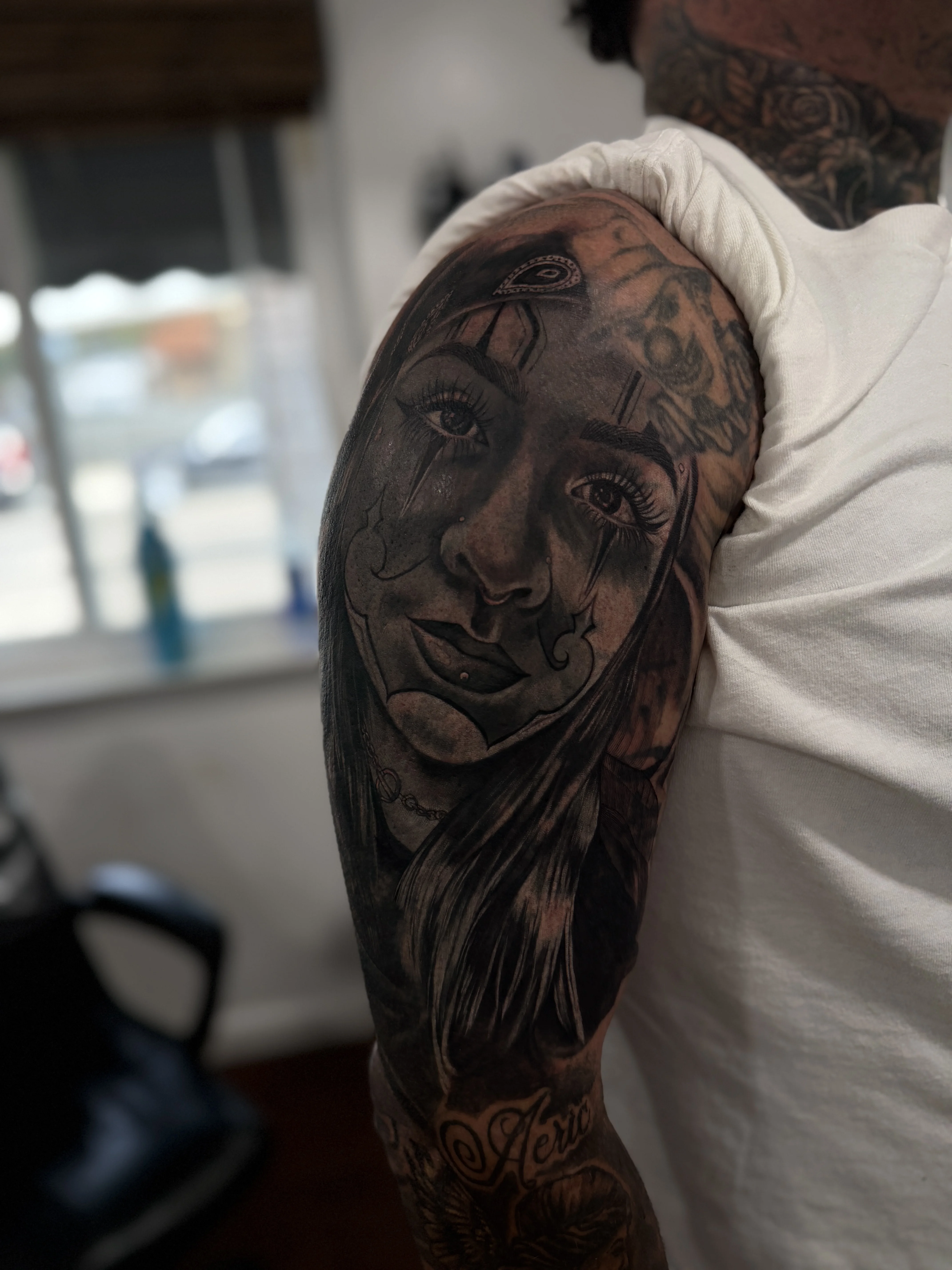 Realistic Clown Face Upper Arm: woman, face, clown makeup, eye, hair, dark