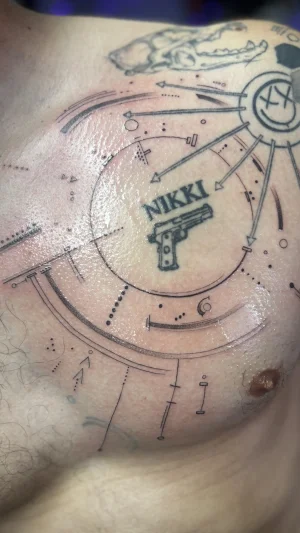 Minimalist Gun and Geometric Chest Piece