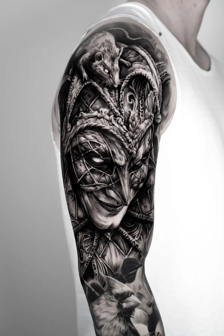 Black & Gray Realism tattoo by Ivan Cavassana: jester mask, rat, cat, dark