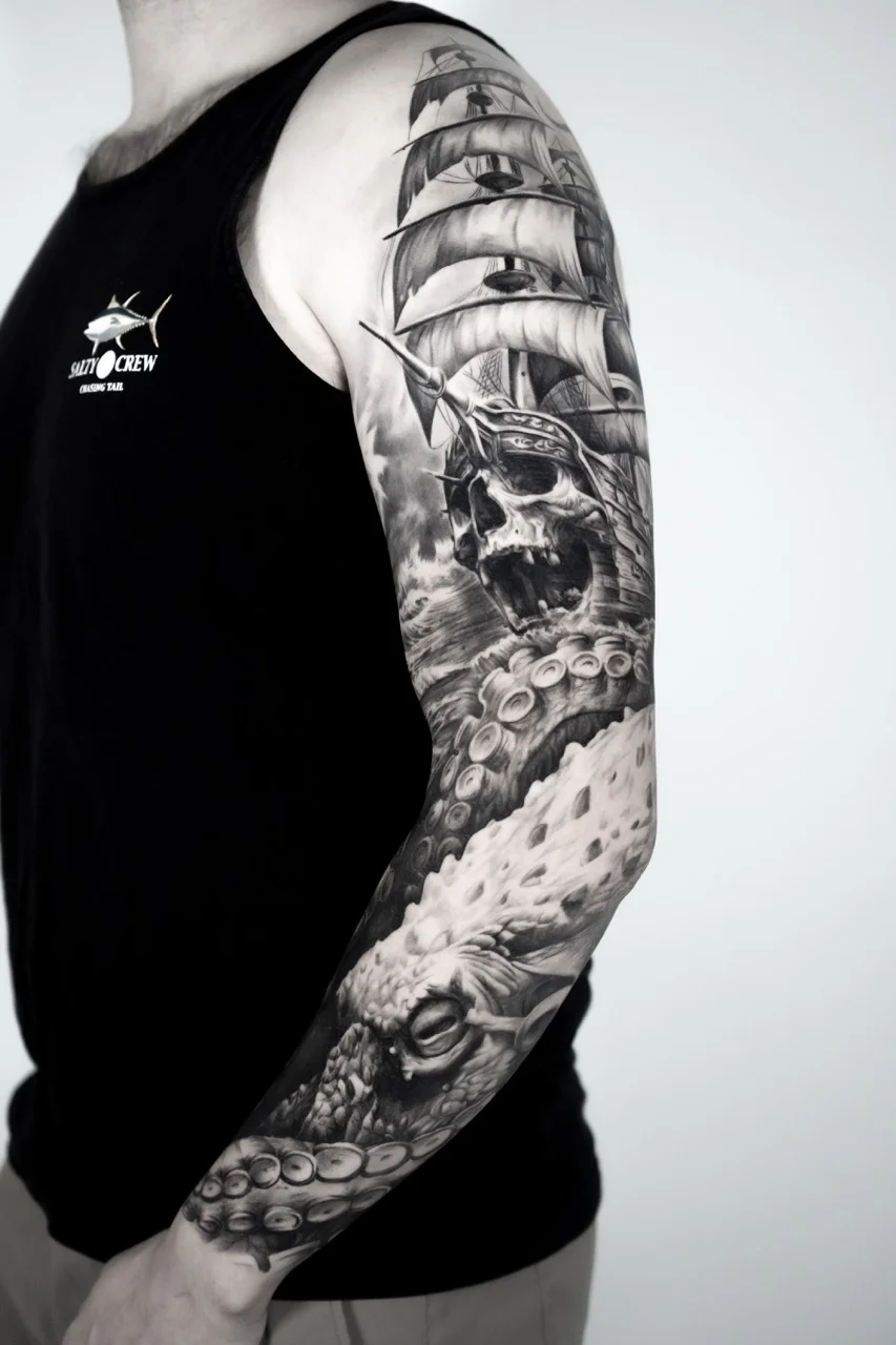 Black & Gray Realism tattoo by Ivan Cavassana: sailing ship, skull, eye, tentacles