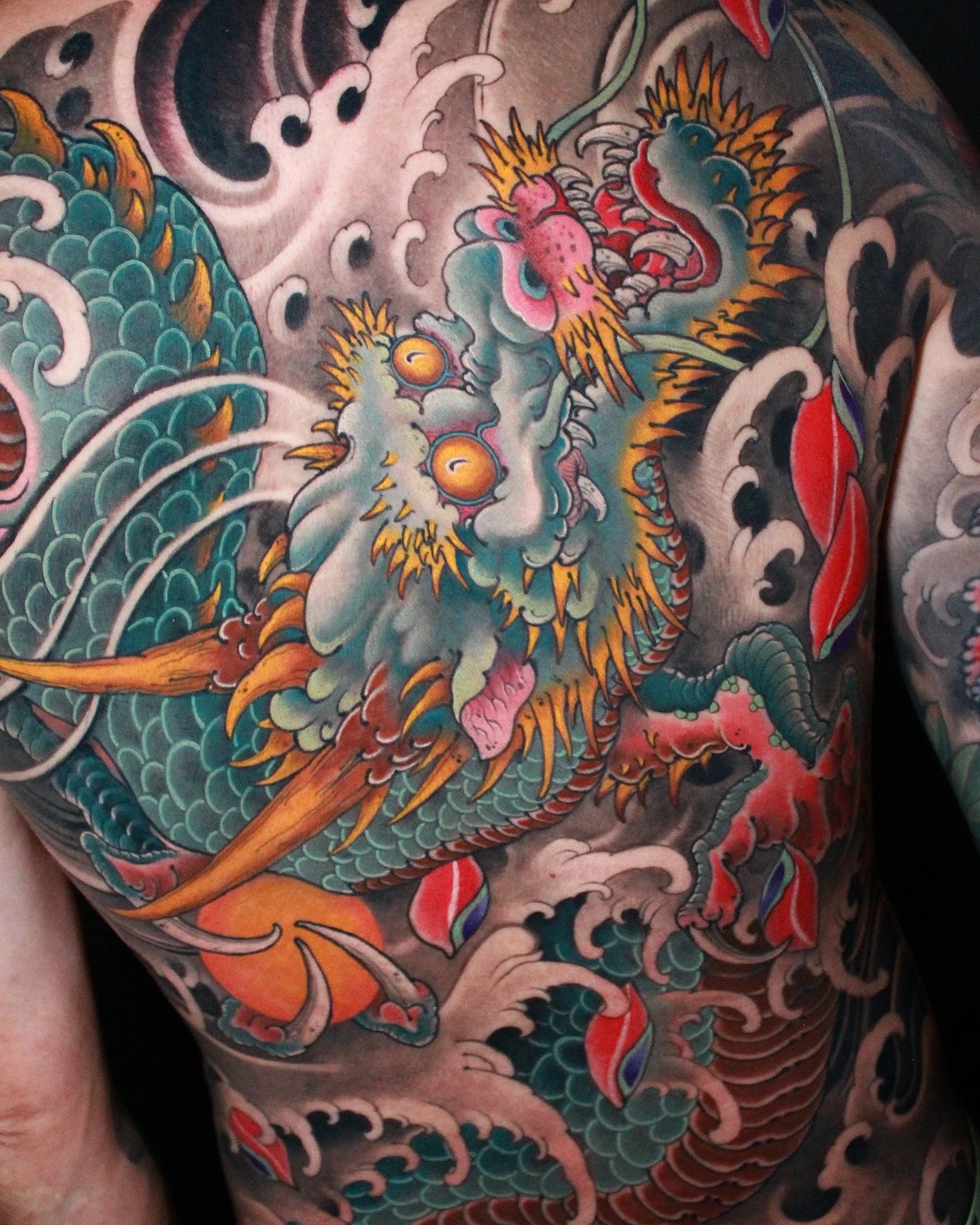 Japanese tattoo by Hocheon ART: dragon, waves, scales, fire