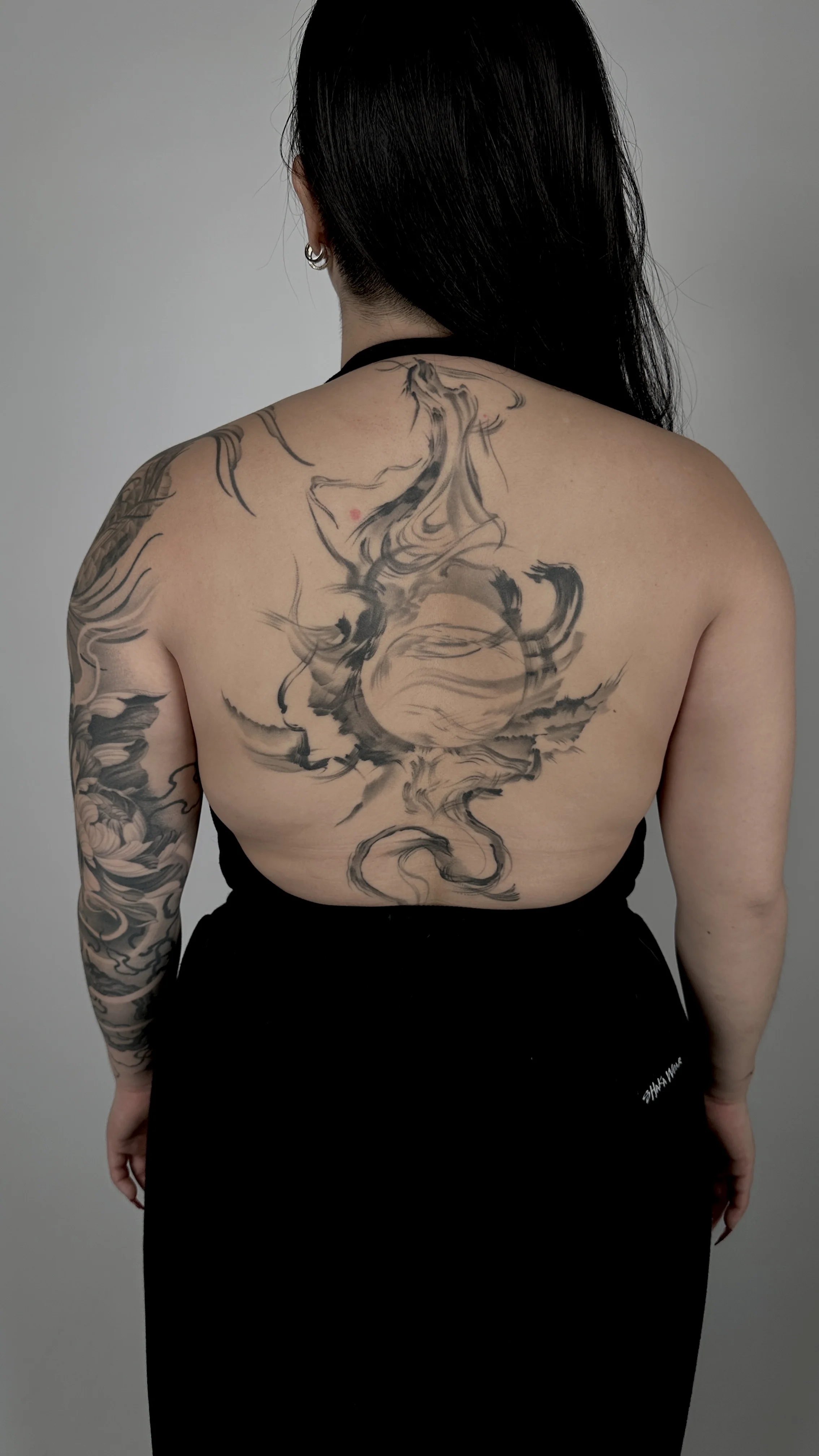 Black & Gray Realism tattoo by Gabriella Nova: dragon, moon, mythology, fantasy