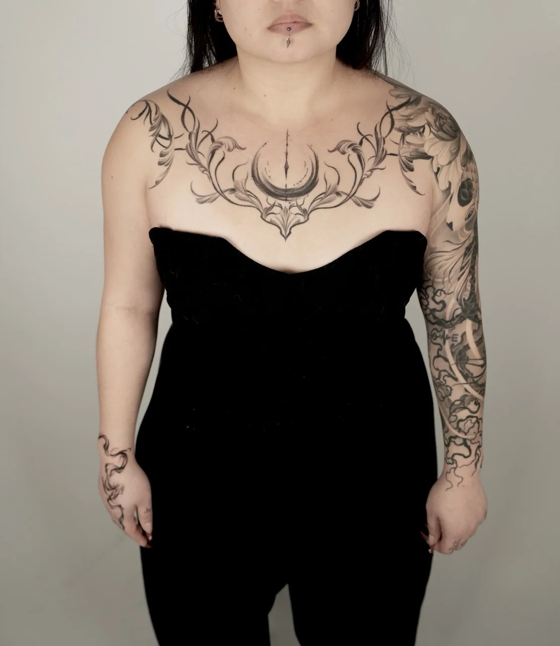 Blackwork tattoo by Gabriella Nova: crescent moon, floral vine, peony flower, mandala