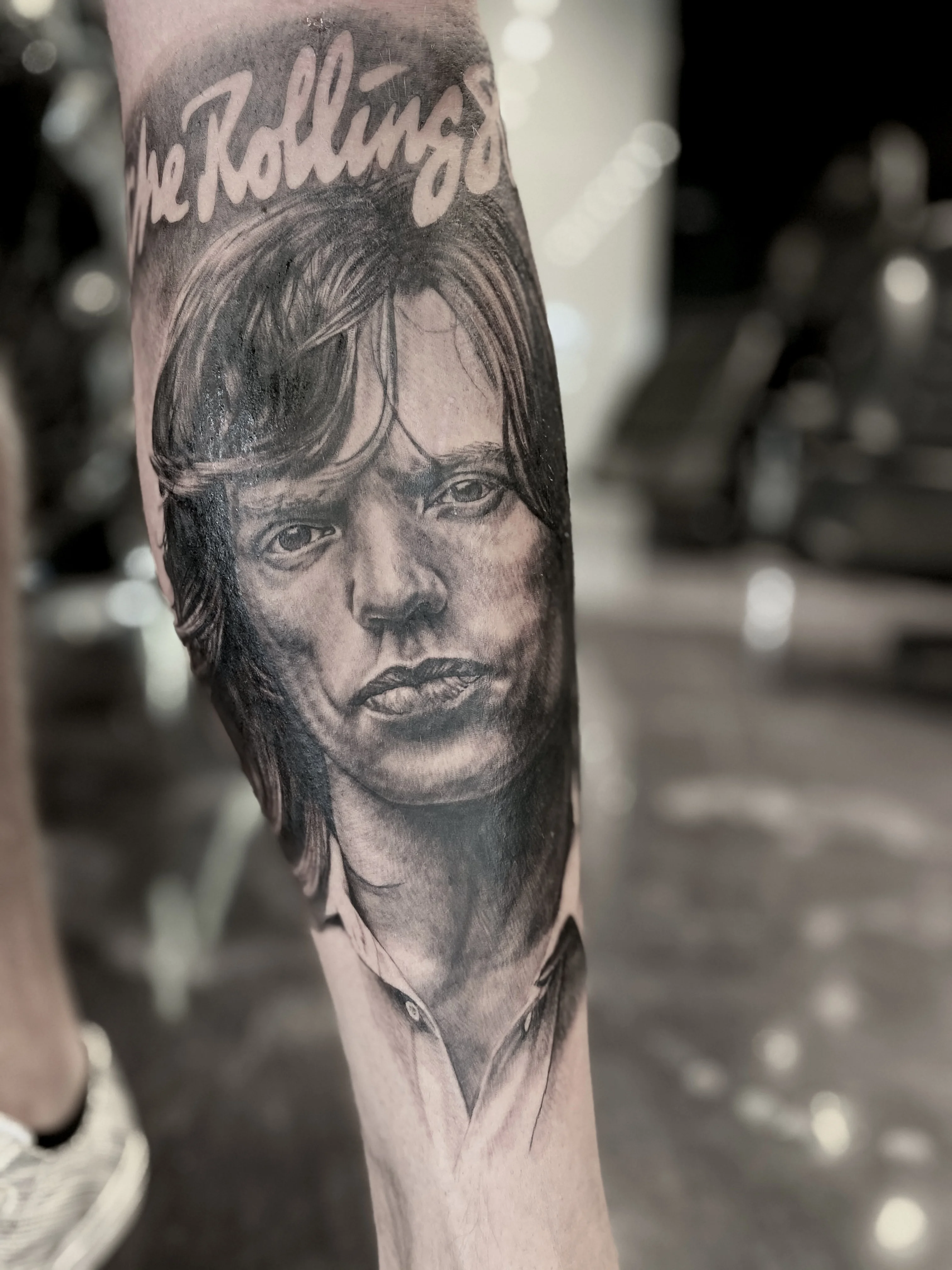Black & Gray Realism tattoo by levi70six: portrait, man, the rolling stones text, music