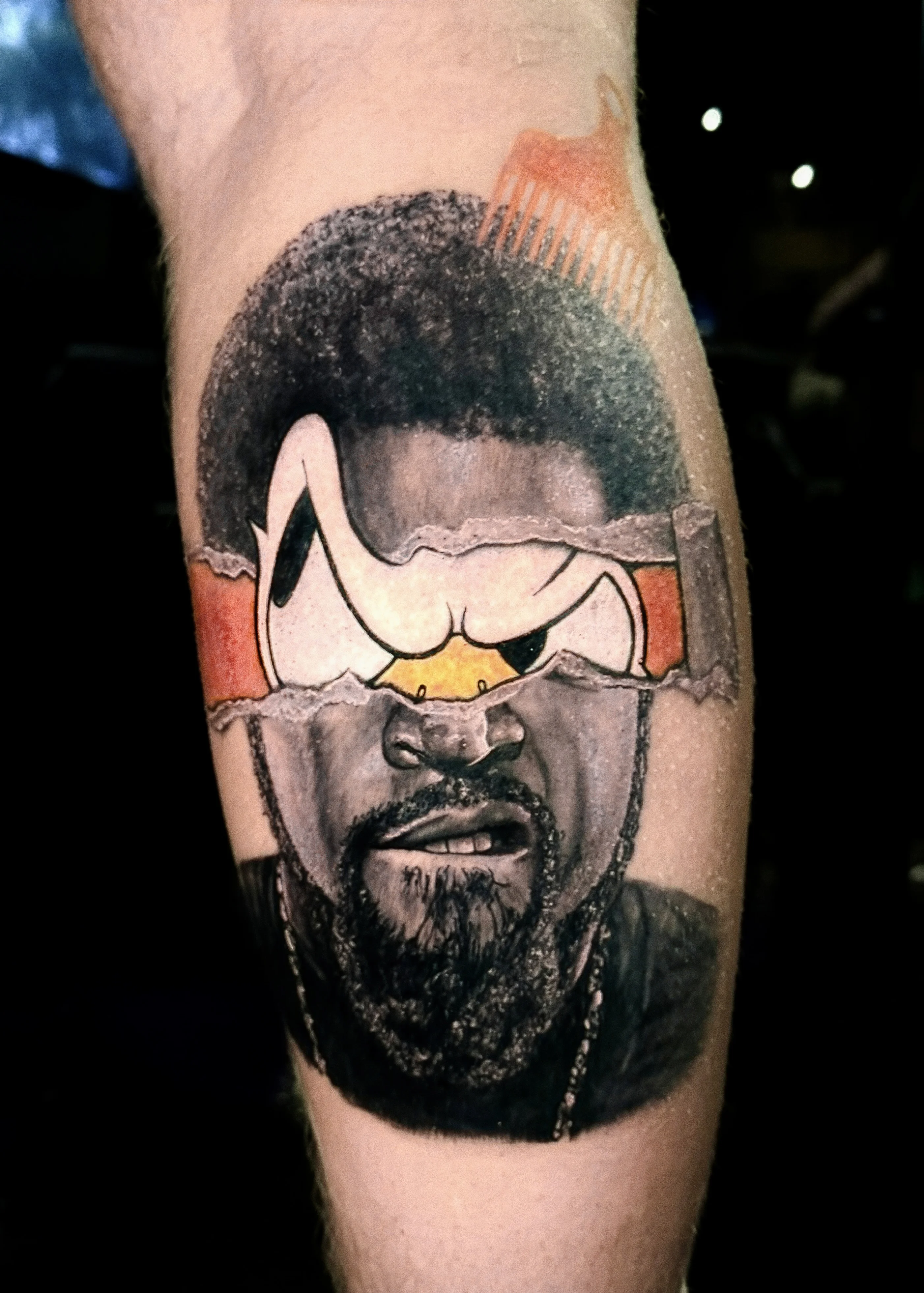 Black & Gray Realism tattoo by levi70six: man, afro hairstyle, goatee, cartoon duck eyes