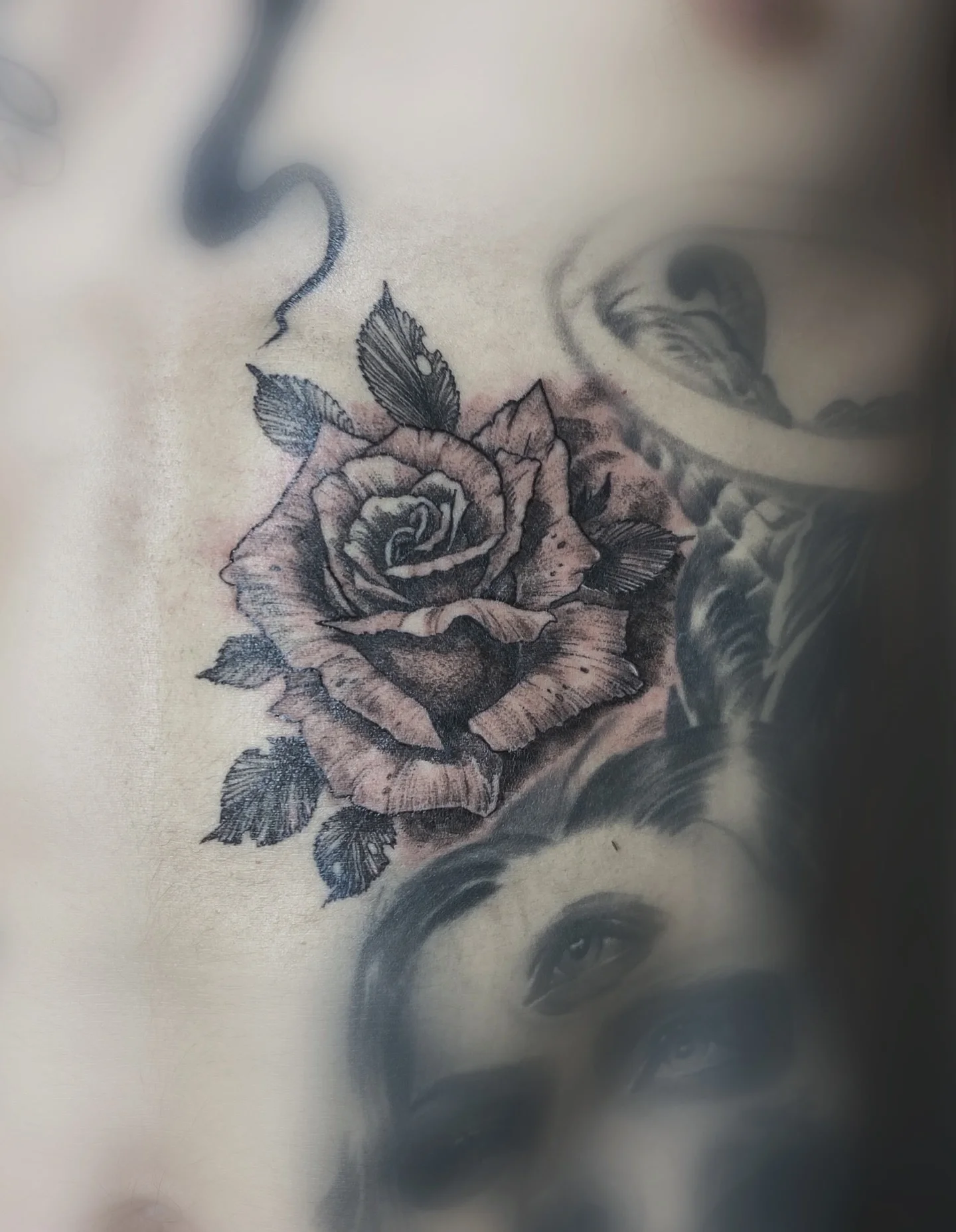 Black & Gray Realism tattoo by Wolfhound Tattoo: rose, leaves, female face, third eye