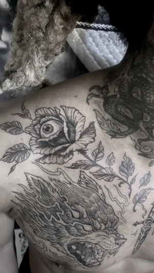 Snarling Wolf and Eye Rose Chest Piece