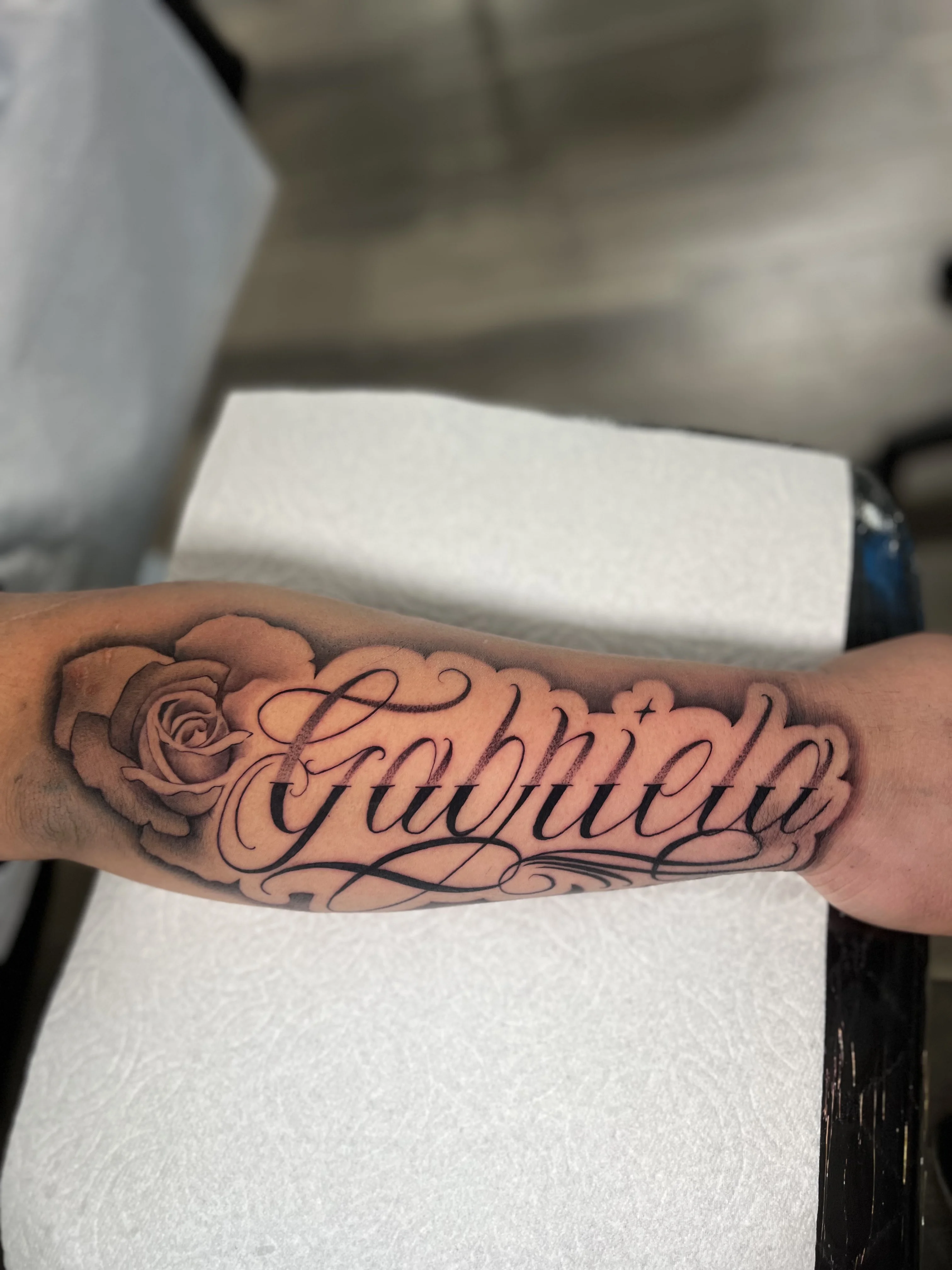 Black & Gray Realism tattoo by Buffy_tatts: rose, name lettering, floral, romantic