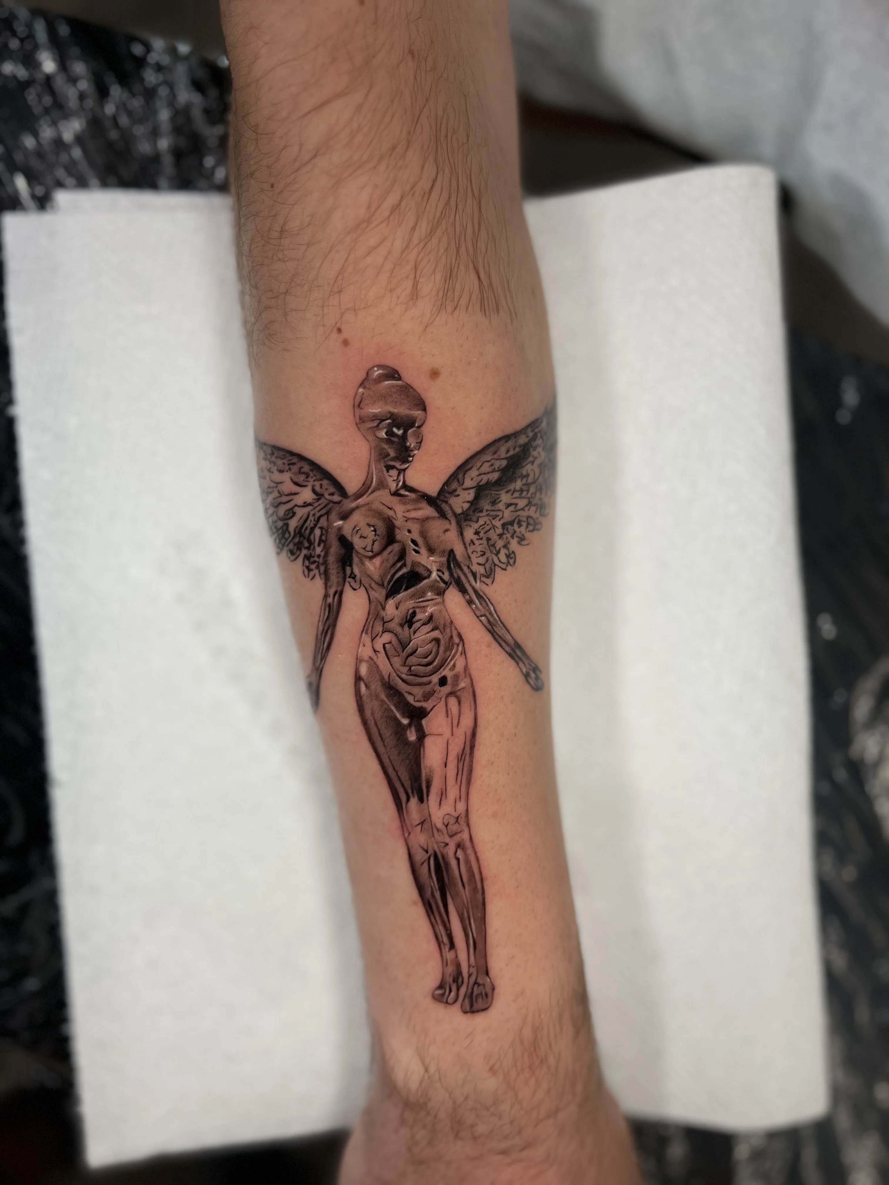 Black & Gray Realism tattoo by Buffy_tatts: female anatomy, angel wings, skull, dark
