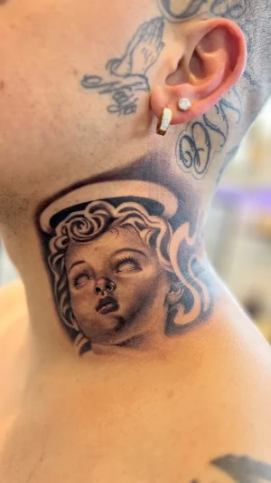 Realistic Child Face Neck Tattoo