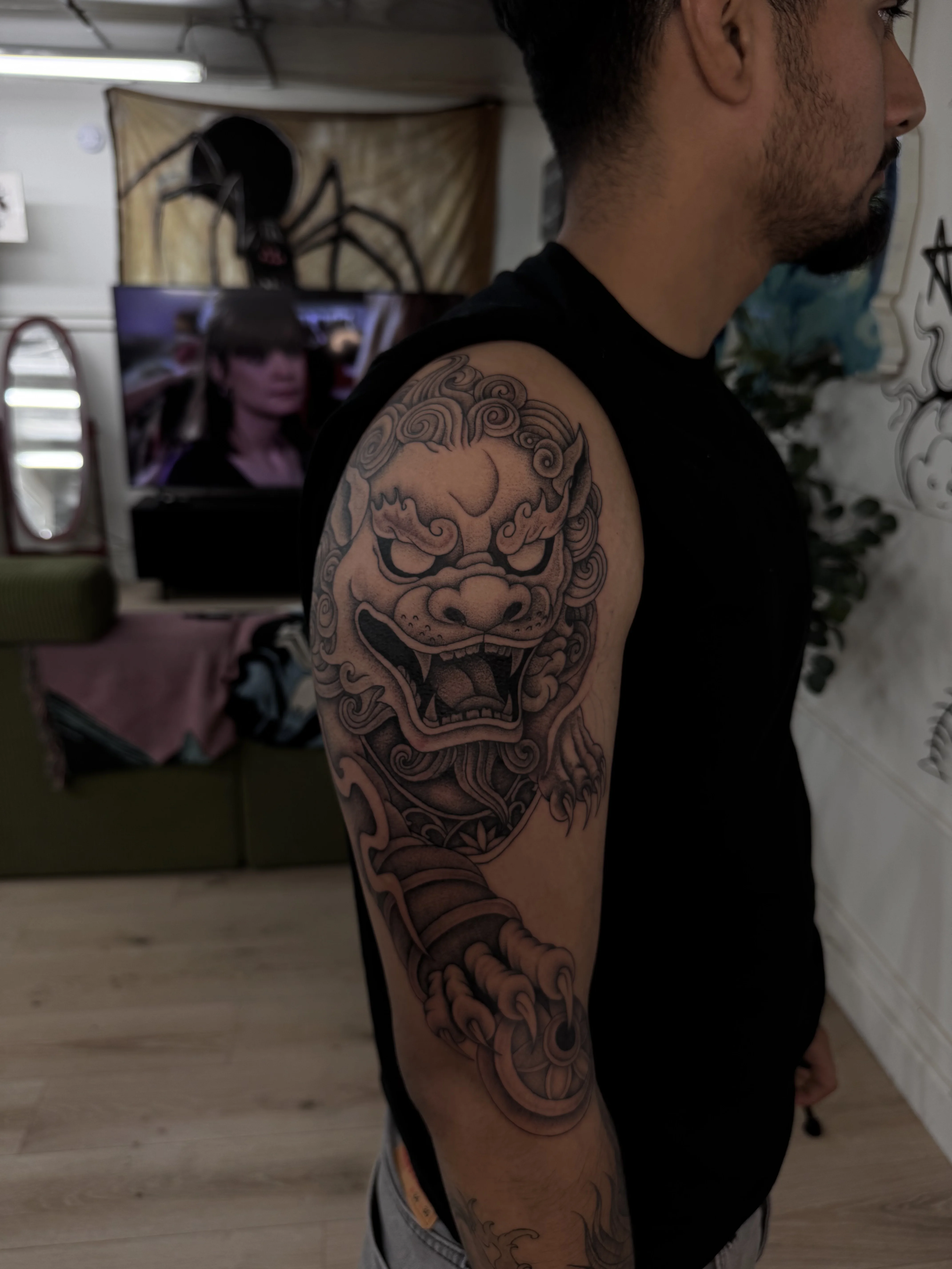Japanese tattoo by Kobe Virgen: foo dog, clouds, orb, lion