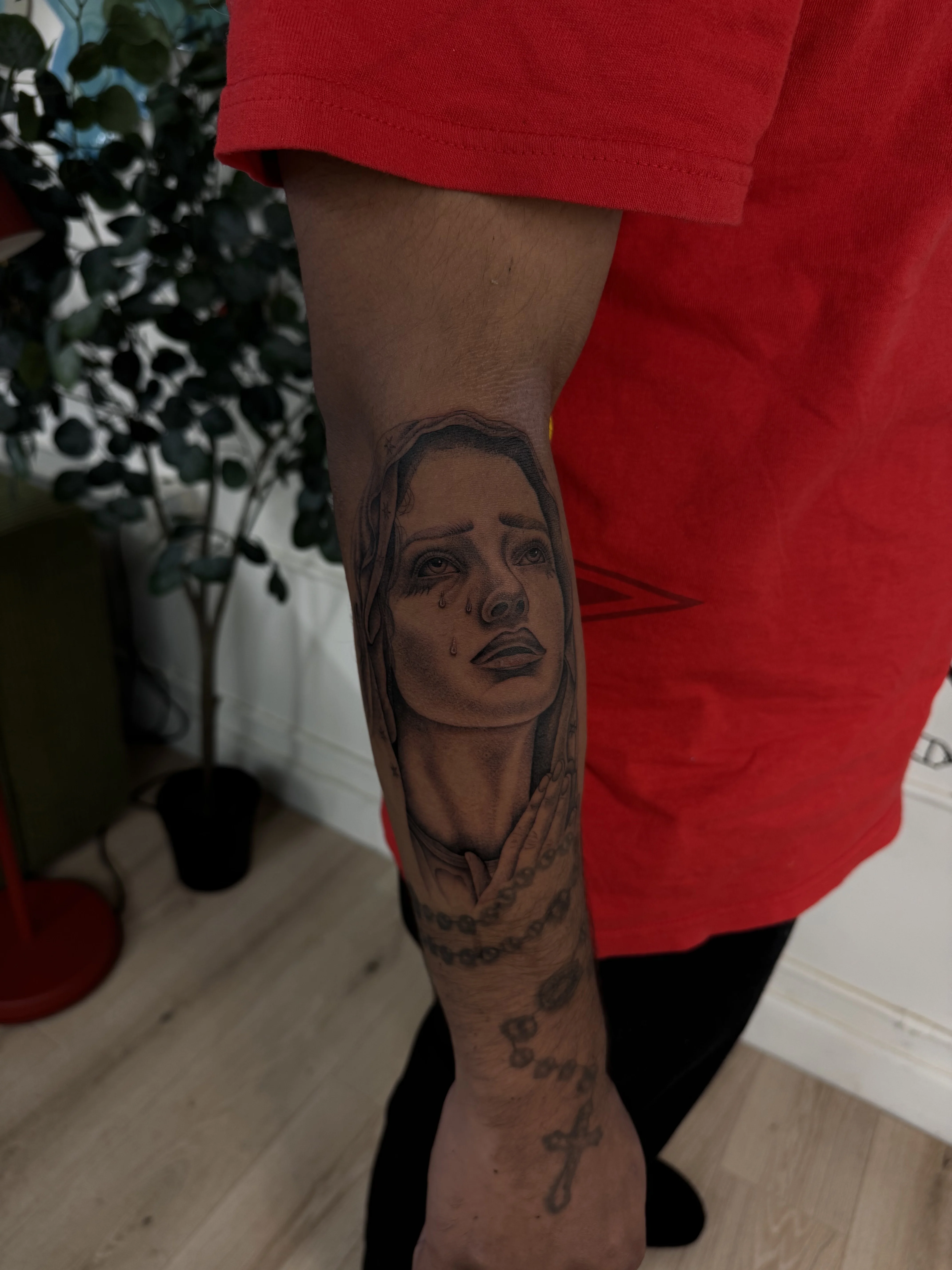 Black & Gray Realism tattoo by Kobe Virgen: woman, rosary, praying hands, tears