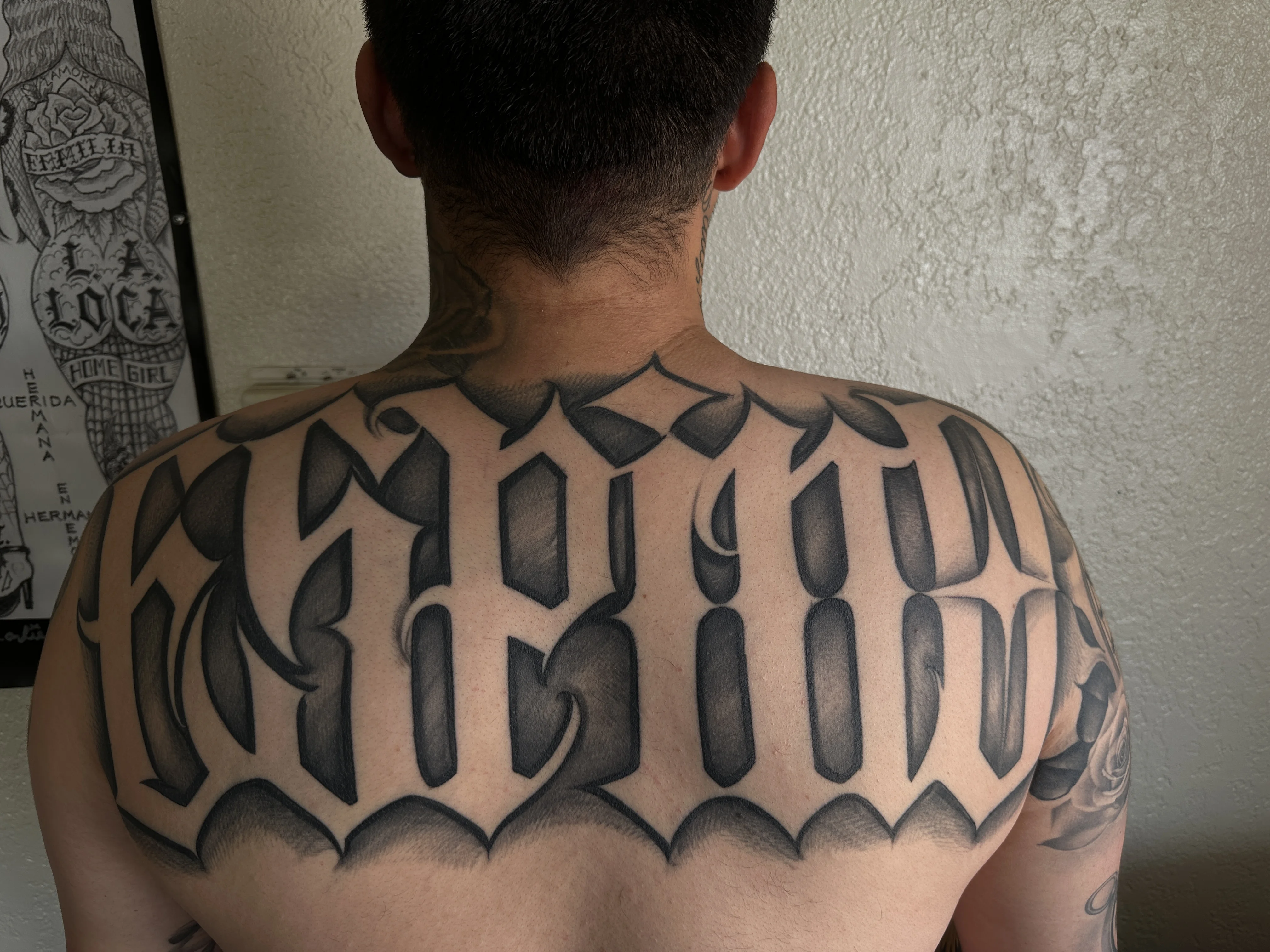 Blackwork tattoo by EL TAKAS: script, lettering, bold, masculine