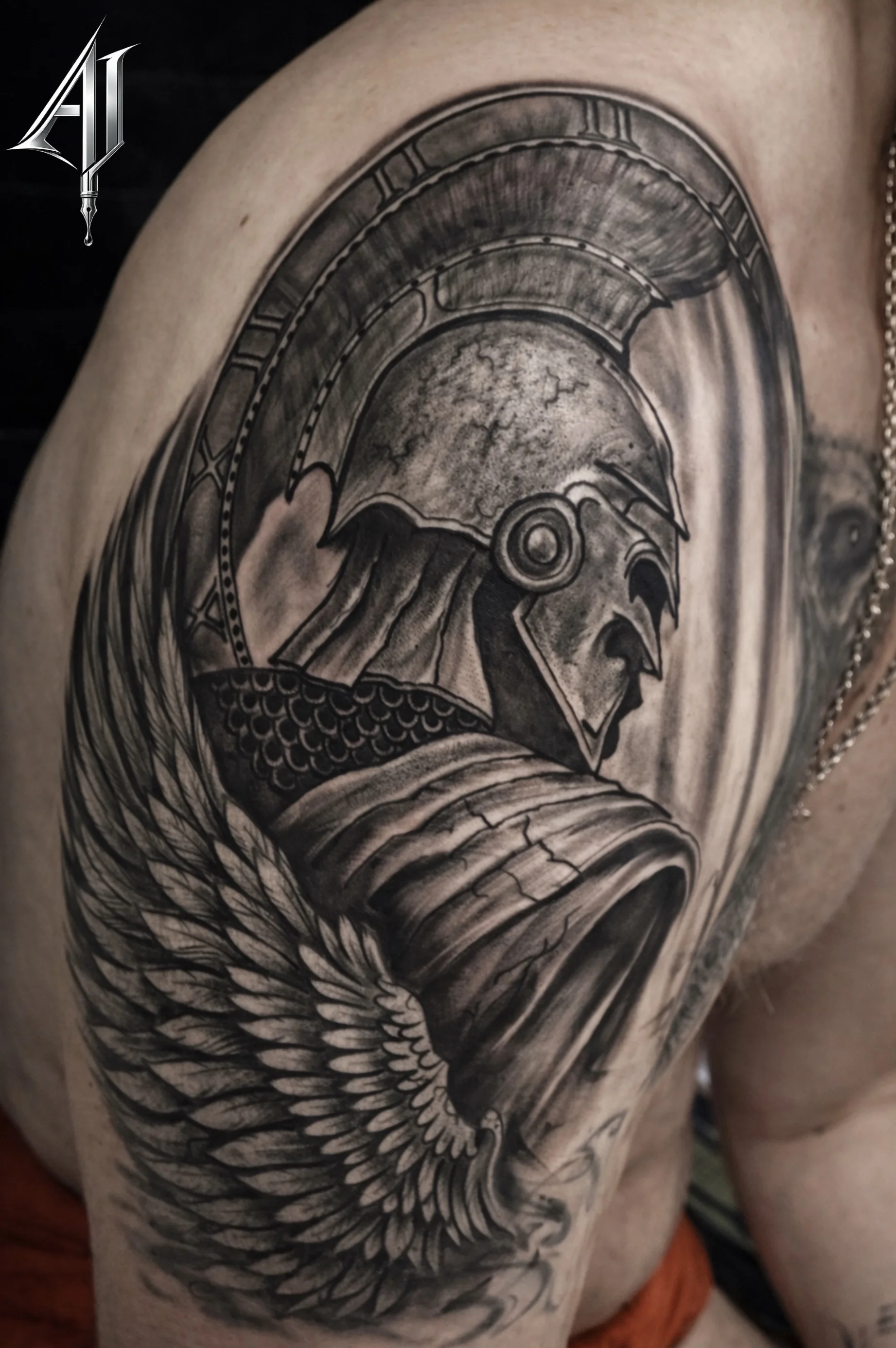 Black & Gray Realism tattoo by Andrei Ilin: roman soldier, helmet, wing, armor