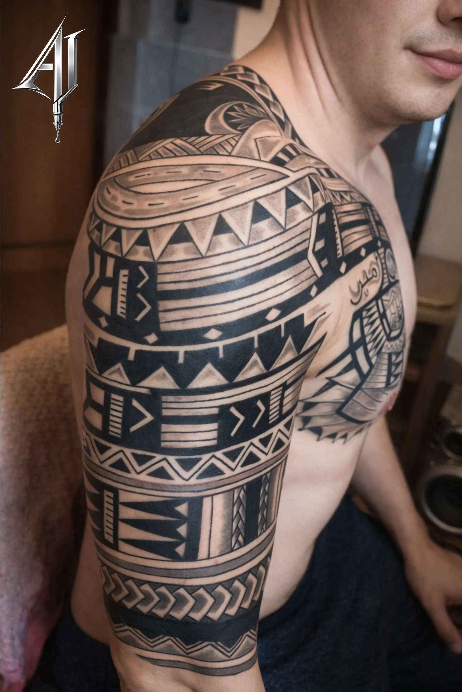 Tribal tattoo by Andrei Ilin: geometric patterns, triangles, chevrons, lines