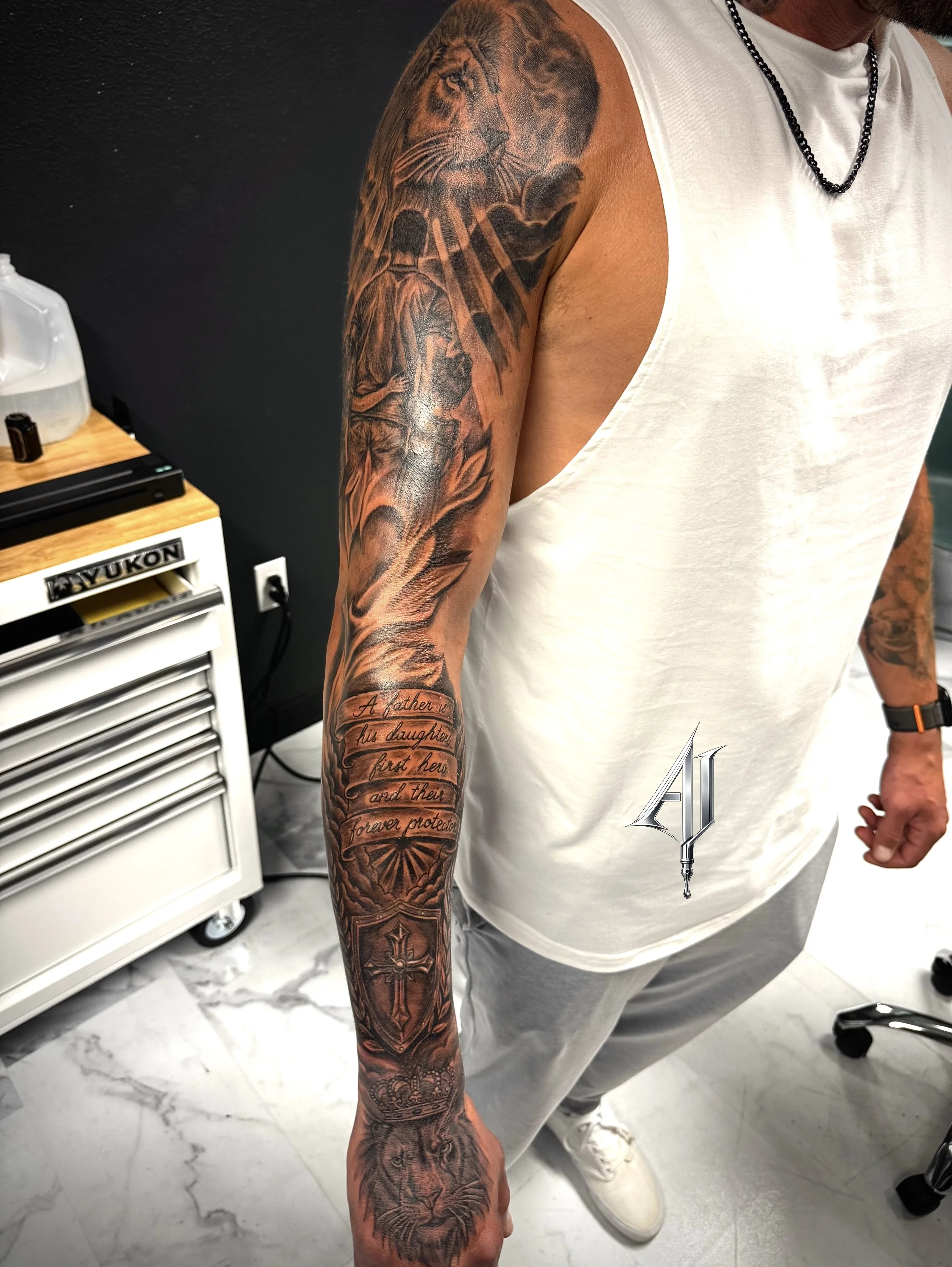 Black & Gray Realism tattoo by Andrei Ilin: lion, man, cross, script