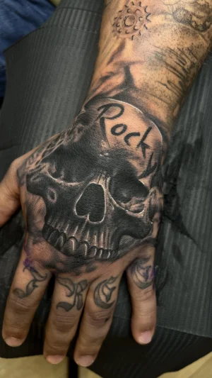 Realistic Skull Hand Tattoo