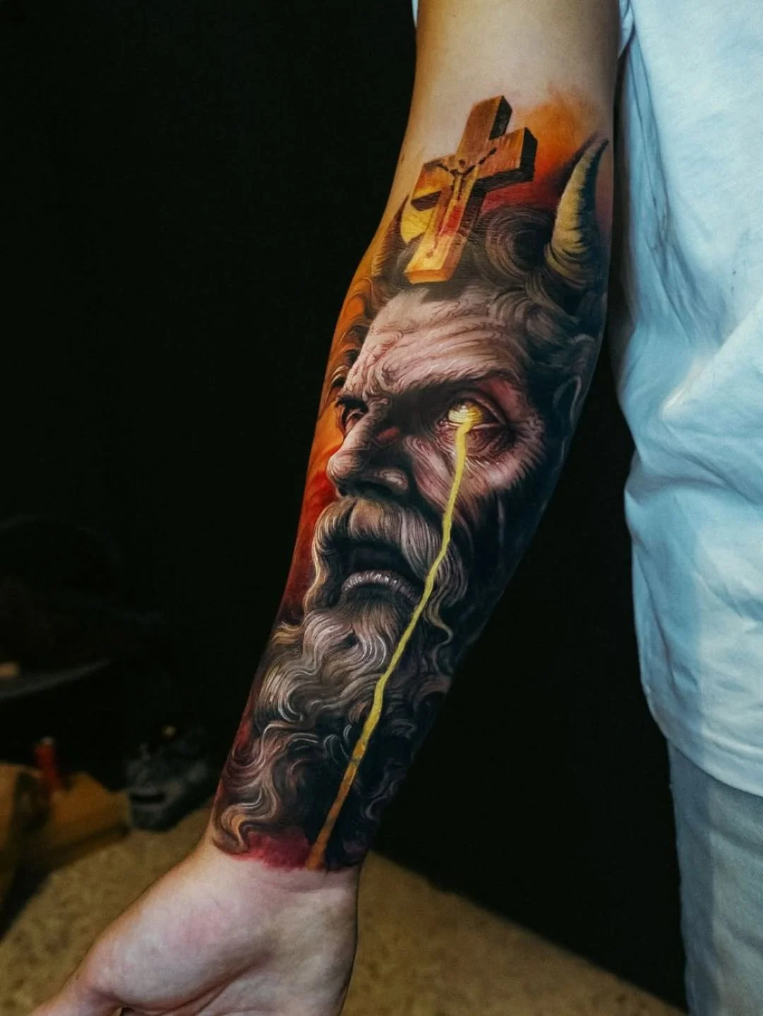 Black & Gray Realism tattoo by Stefano Alcantara: old man, horns, cross, eye