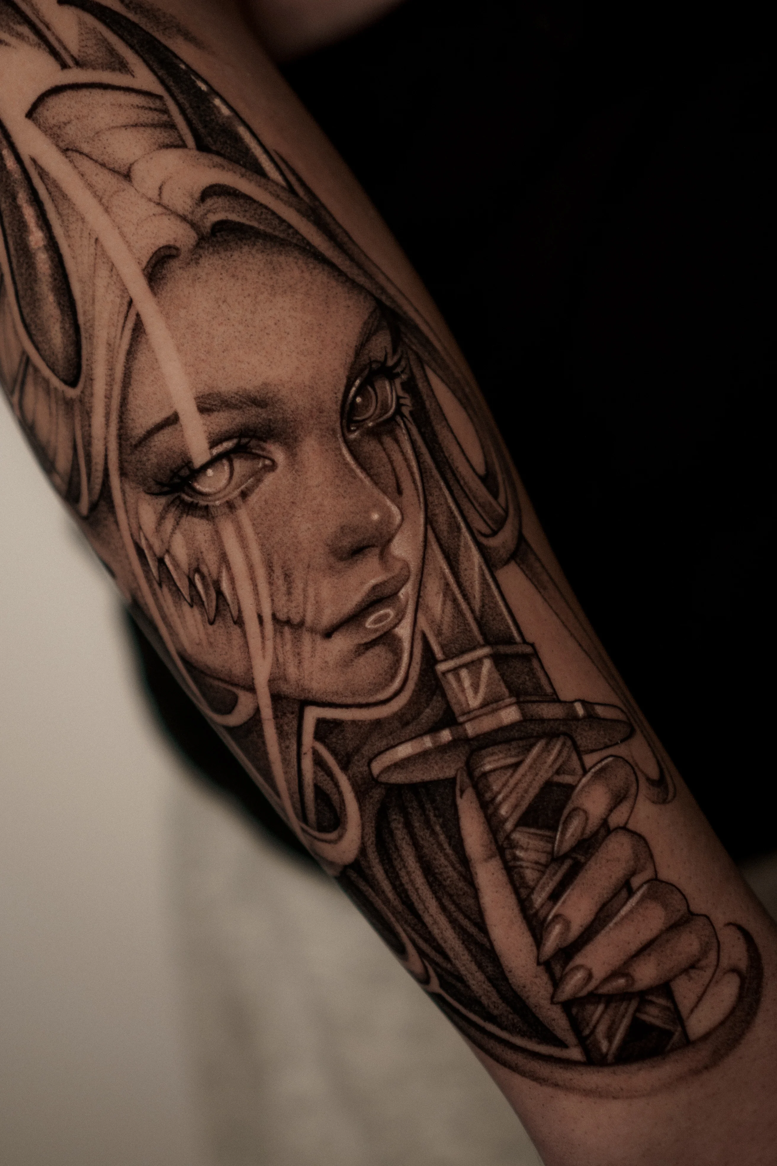 Black & Gray Realism tattoo by Olga Leonova: woman, face, sword, hand