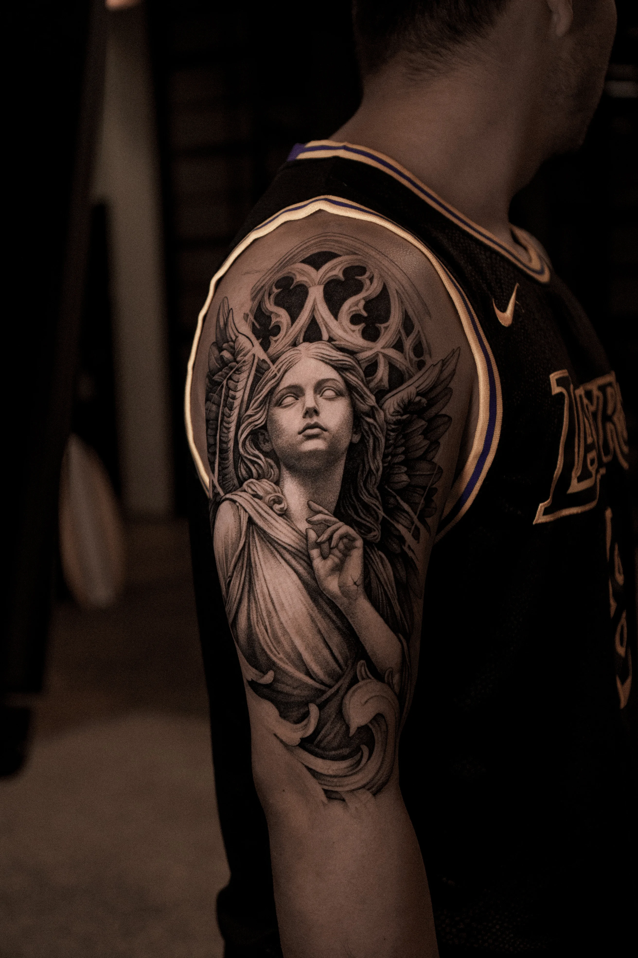 Black & Gray Realism tattoo by Olga Leonova: angel, wings, female figure, halo