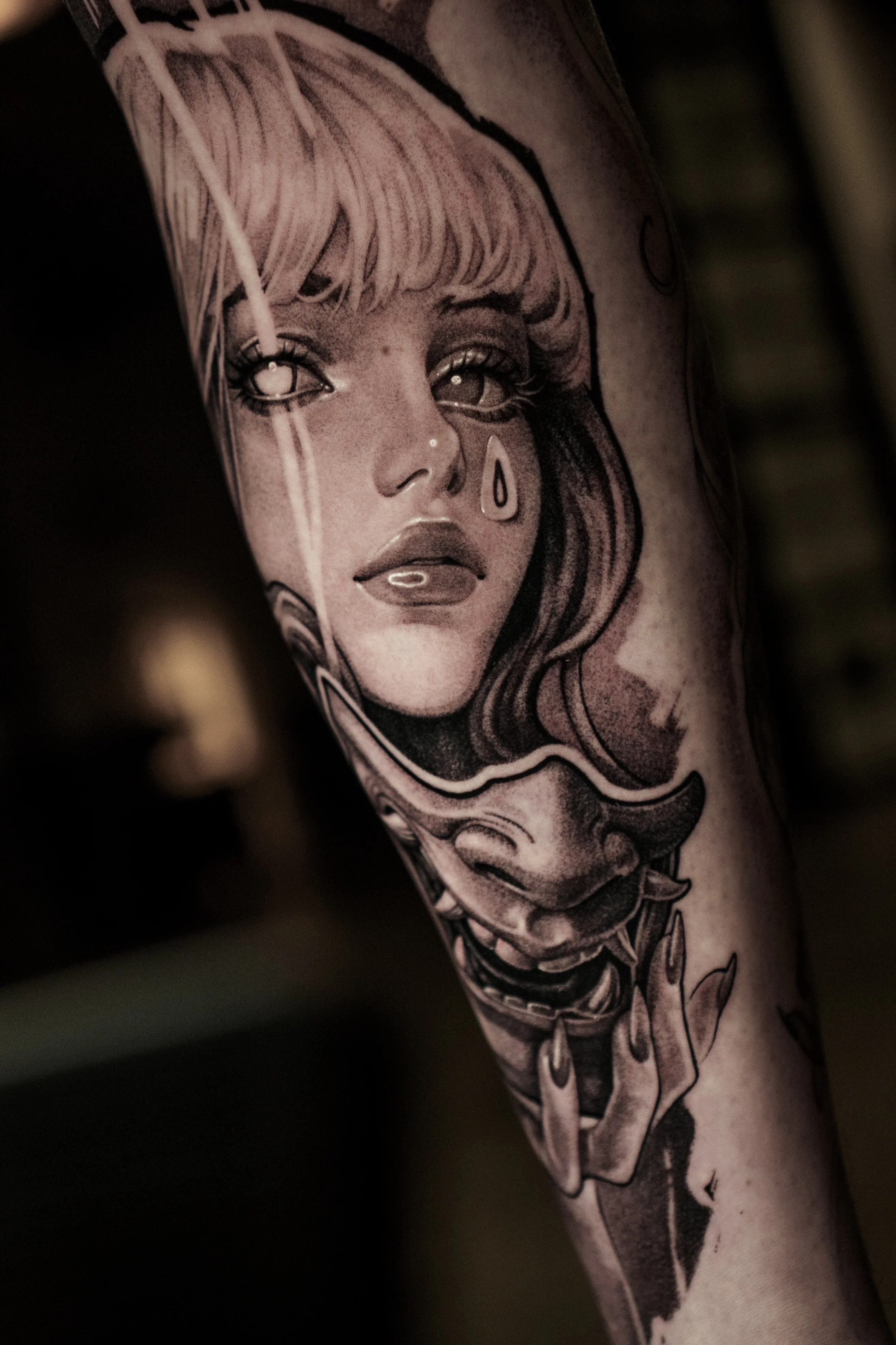 Black & Gray Realism tattoo by Olga Leonova: woman face, tear, demon mask, hand