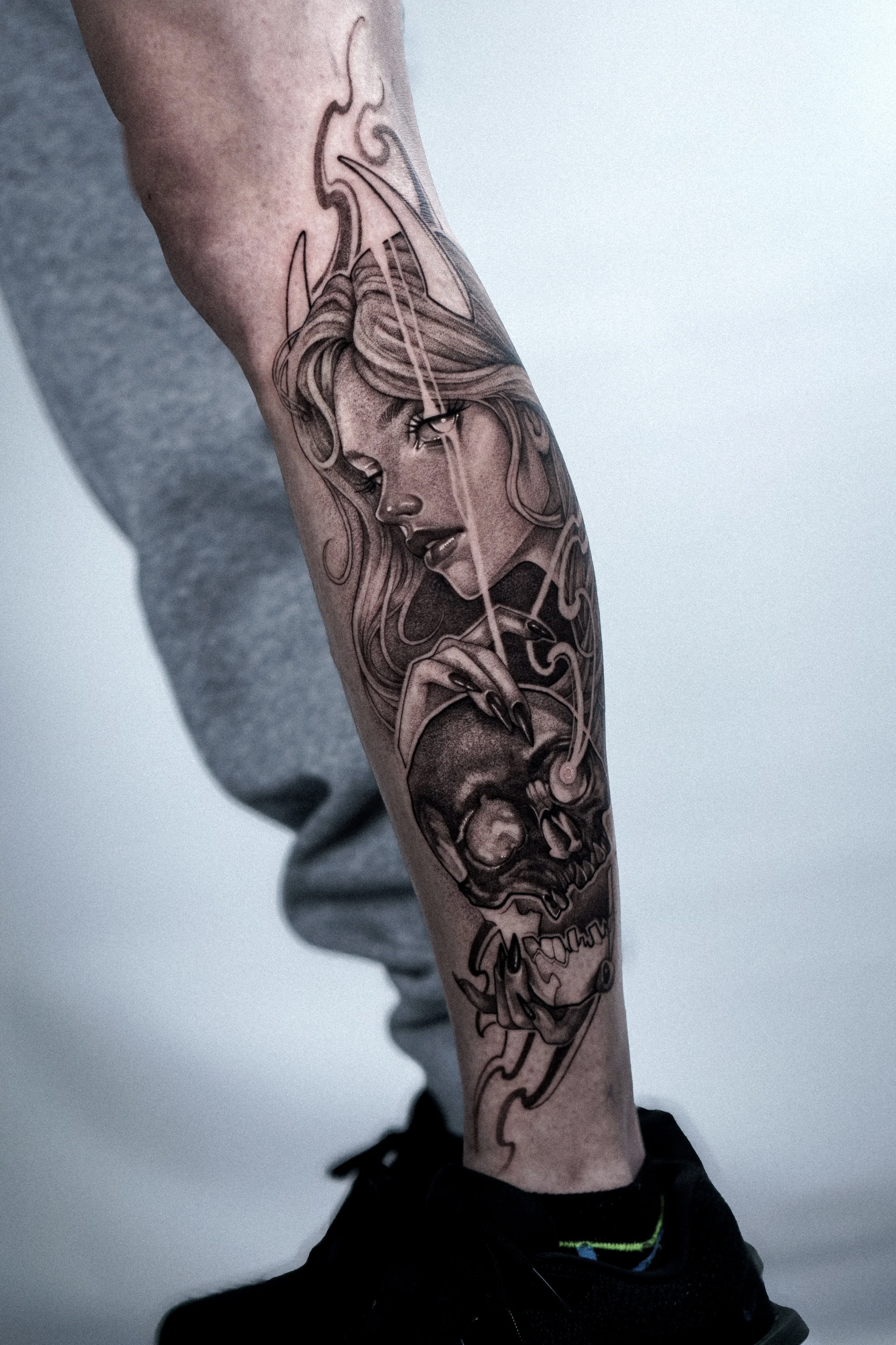 Black & Gray Realism tattoo by Olga Leonova: woman, skull, flames, hand
