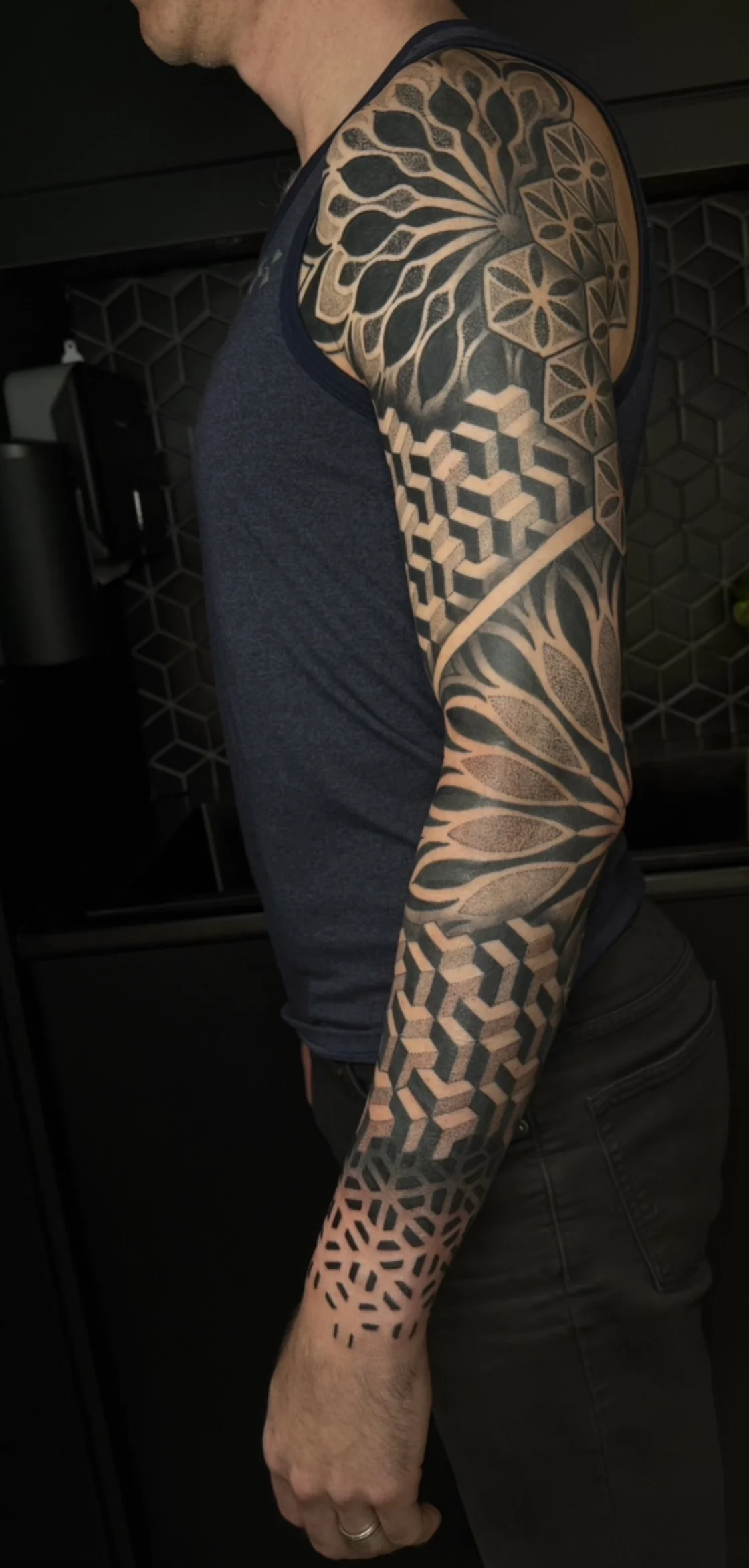 Geometric tattoo by Crystal Alexandria: geometric shapes, hexagons, 3d cubes, petal-like patterns