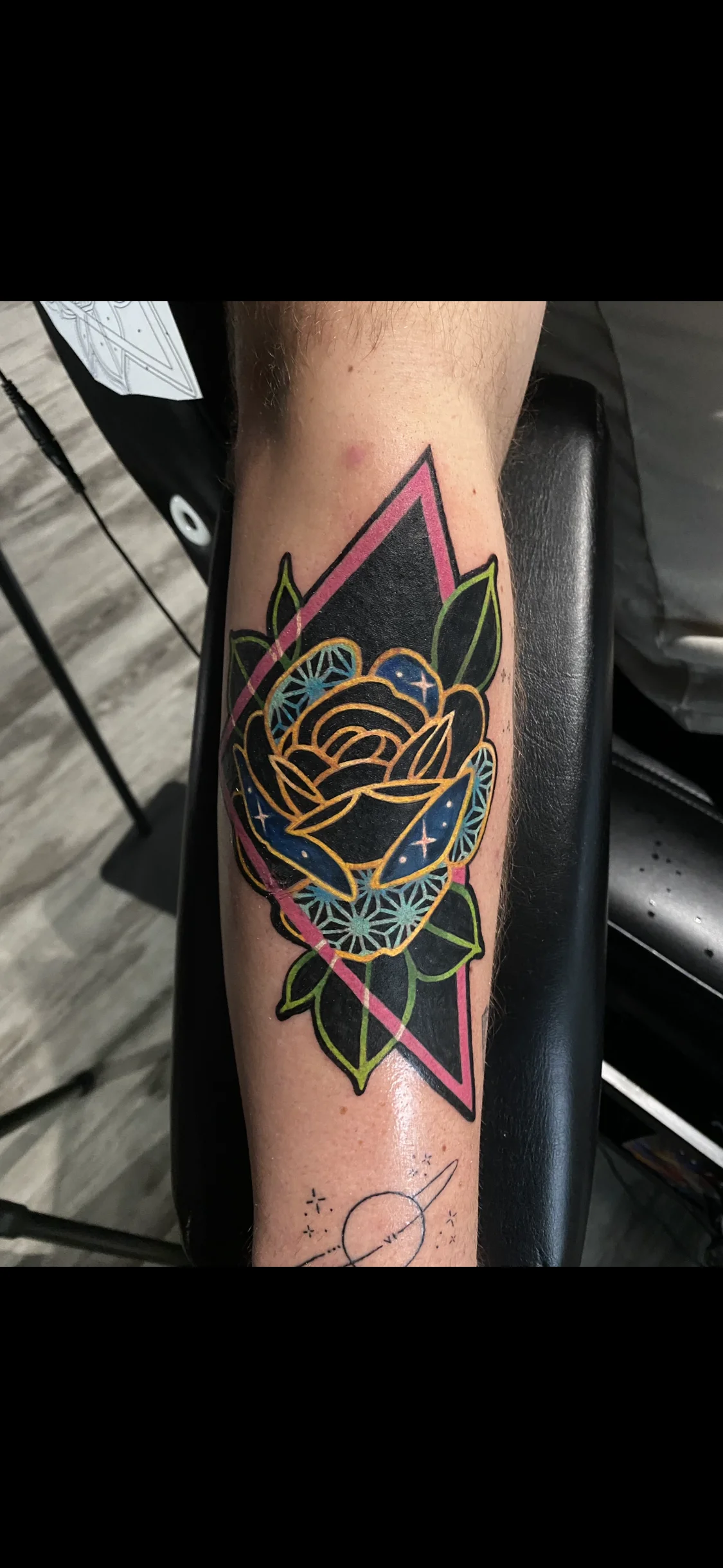 Neo-Traditional tattoo by Crystal Alexandria: rose, leaves, decorative geometric shapes, floral