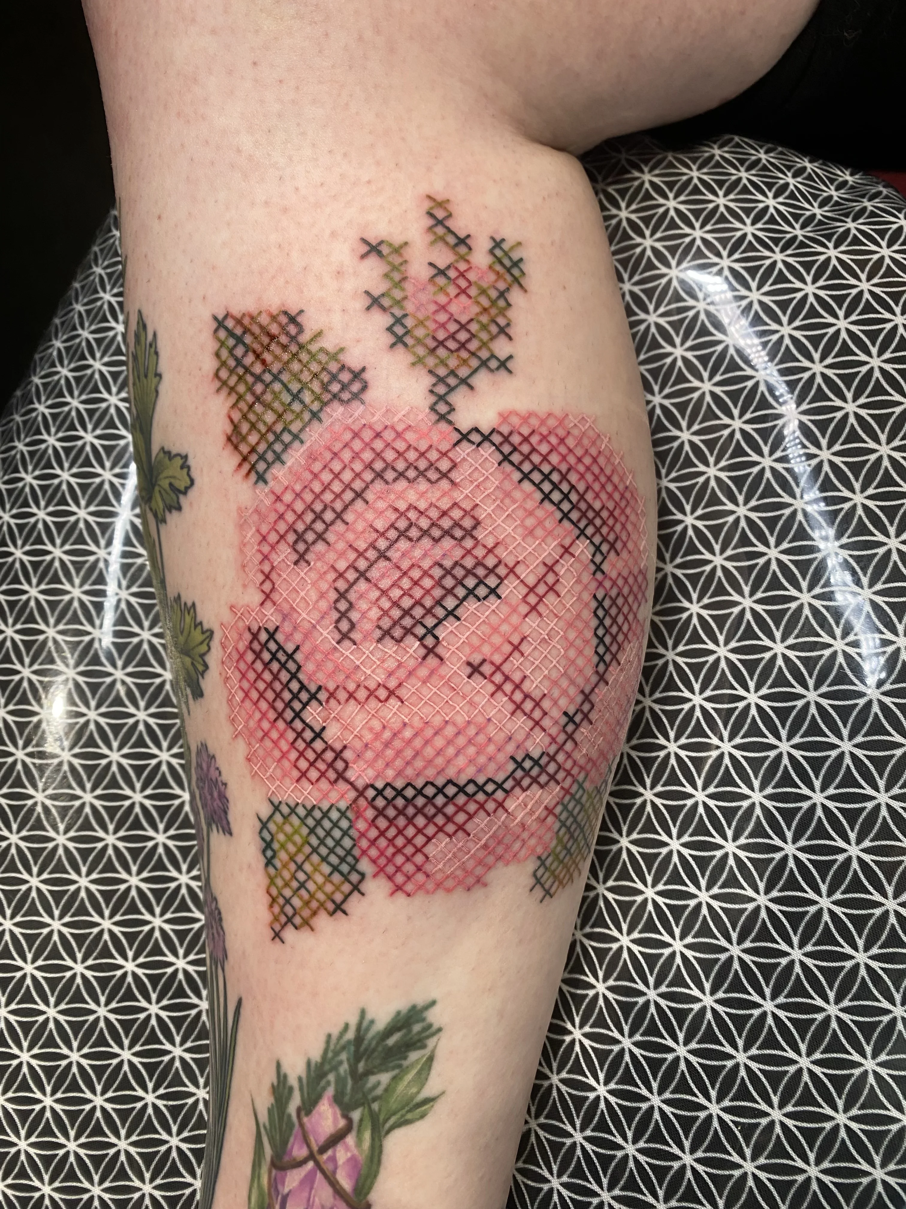 Geometric tattoo by Crystal Alexandria: rose, leaves, floral, nature