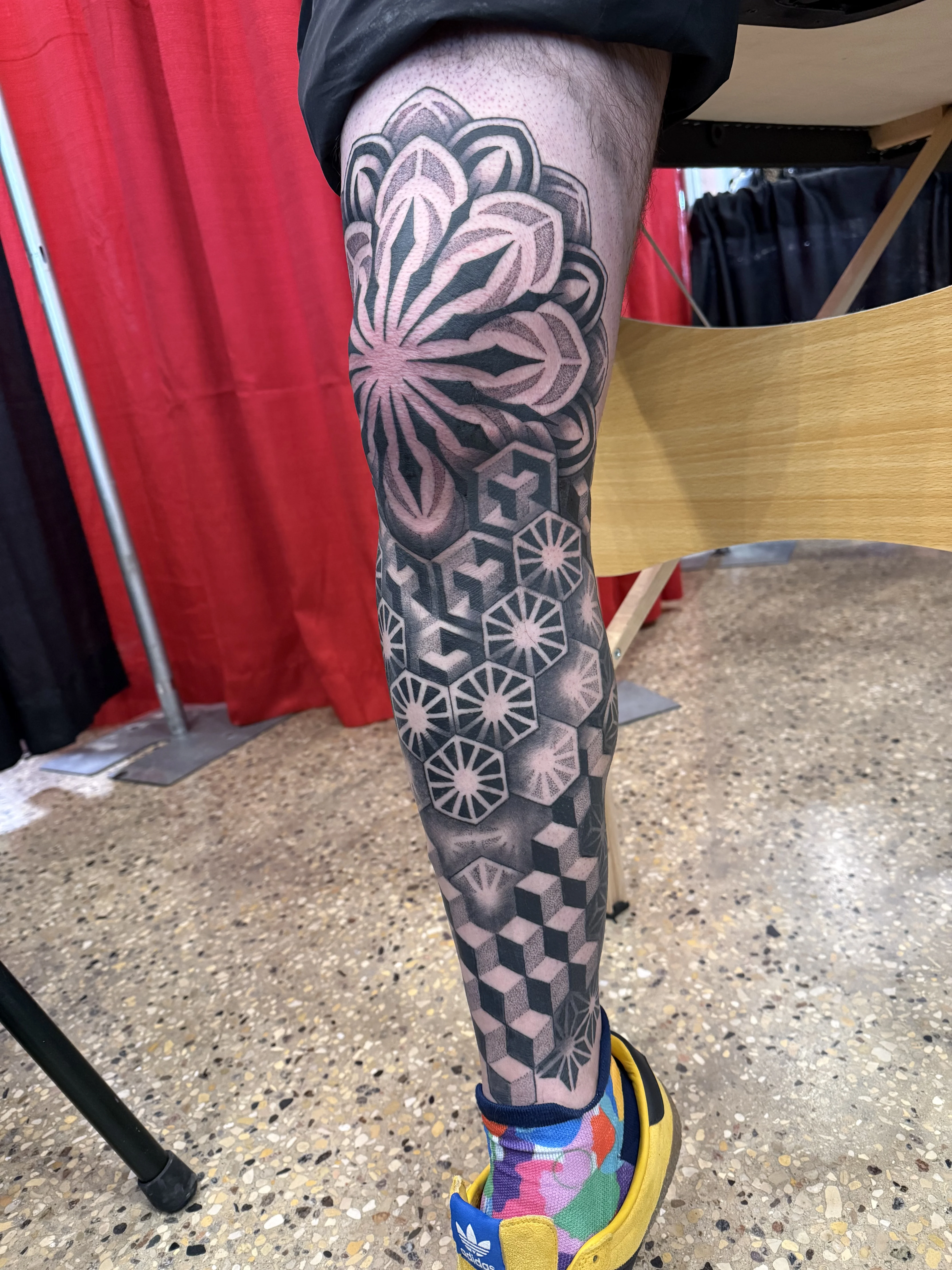 Geometric tattoo by Crystal Alexandria: hexagons, cubes, geometric flower, circle patterns