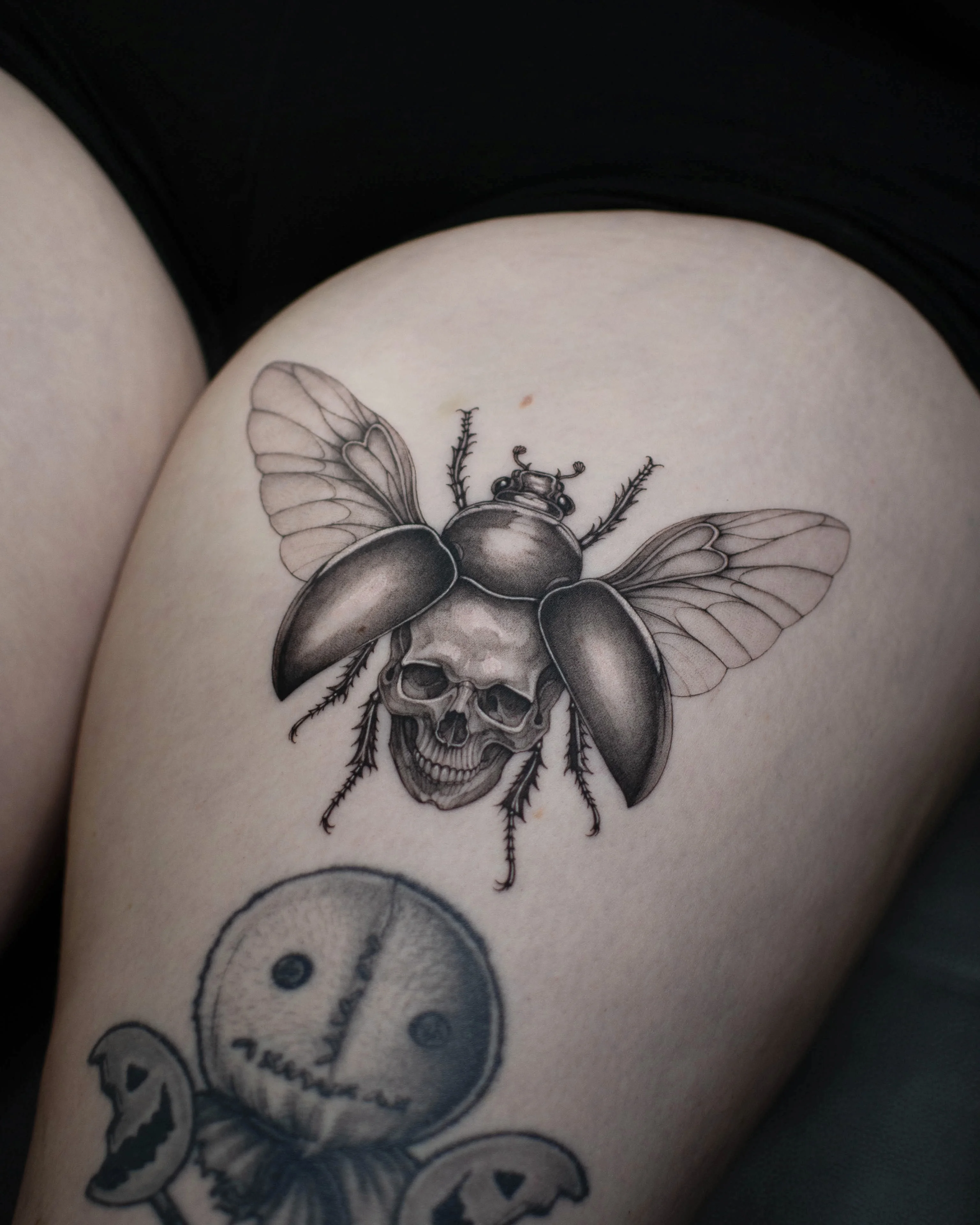 Black & Gray Realism tattoo by Vira.Ink: skull, beetle, insect wings, dark