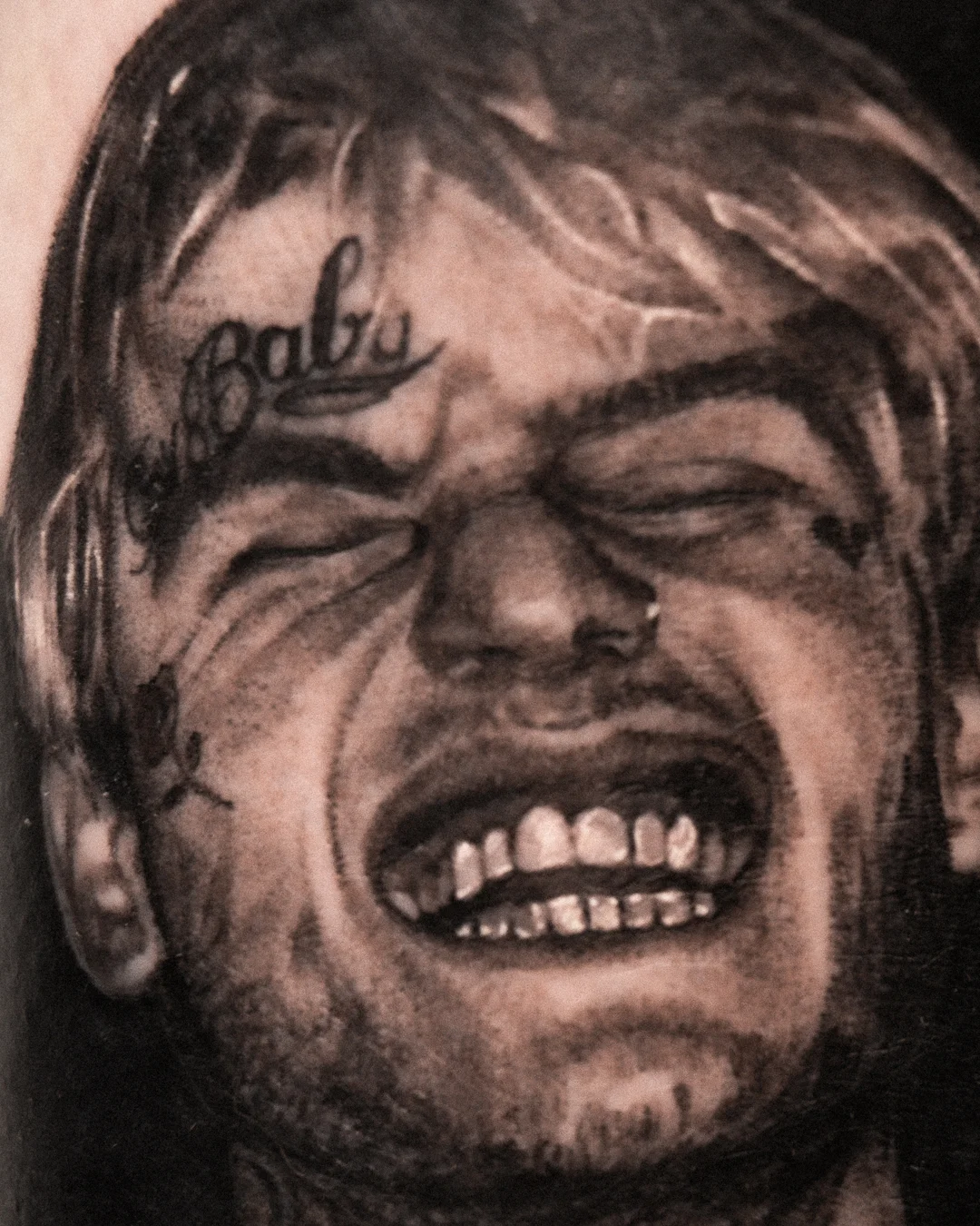 Black & Gray Realism tattoo by Shifu Blue: portrait, teeth, hair, nose ring