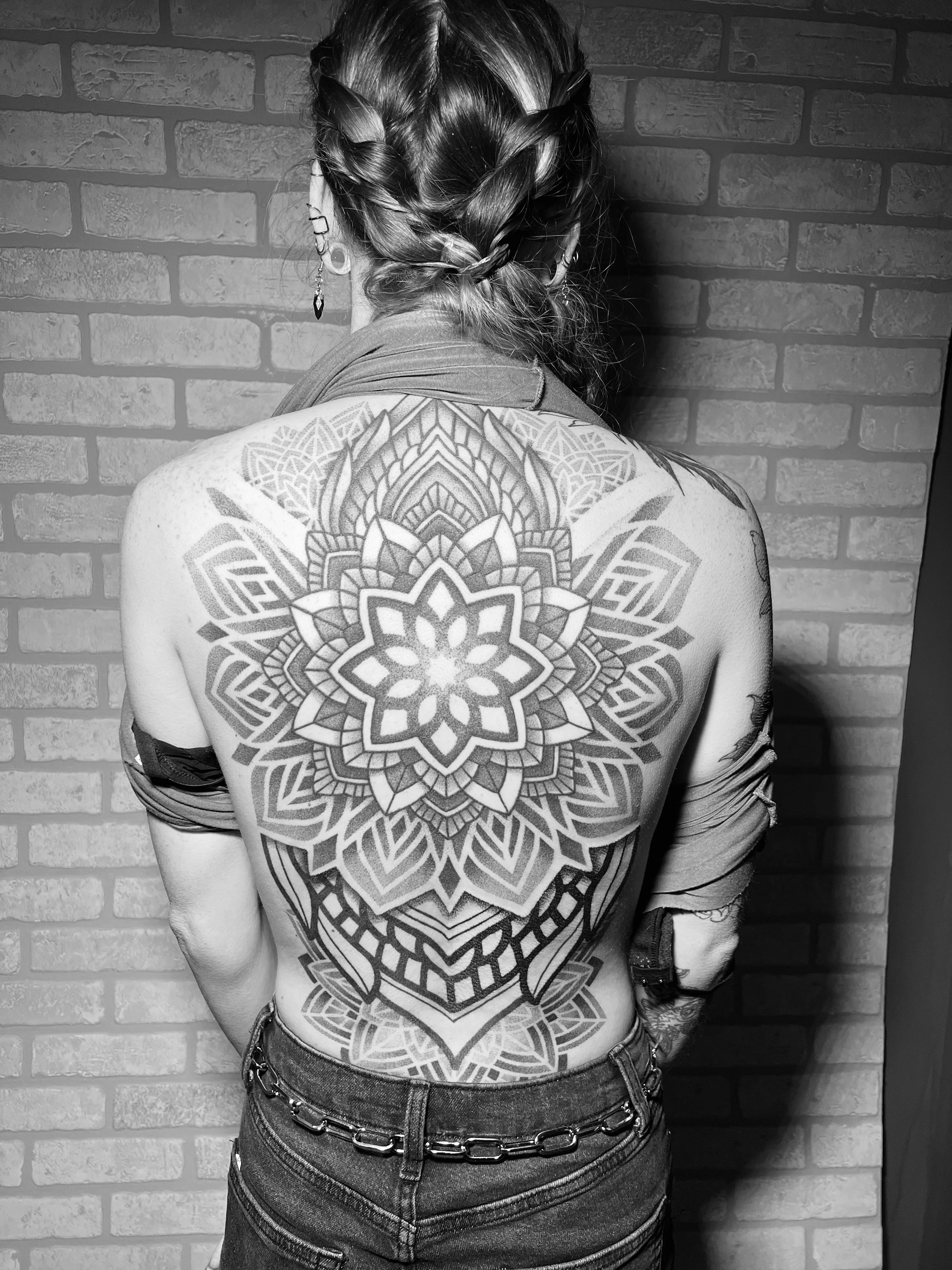 Geometric tattoo by Erin Manning: mandala, flower, abstract shapes, spiritual