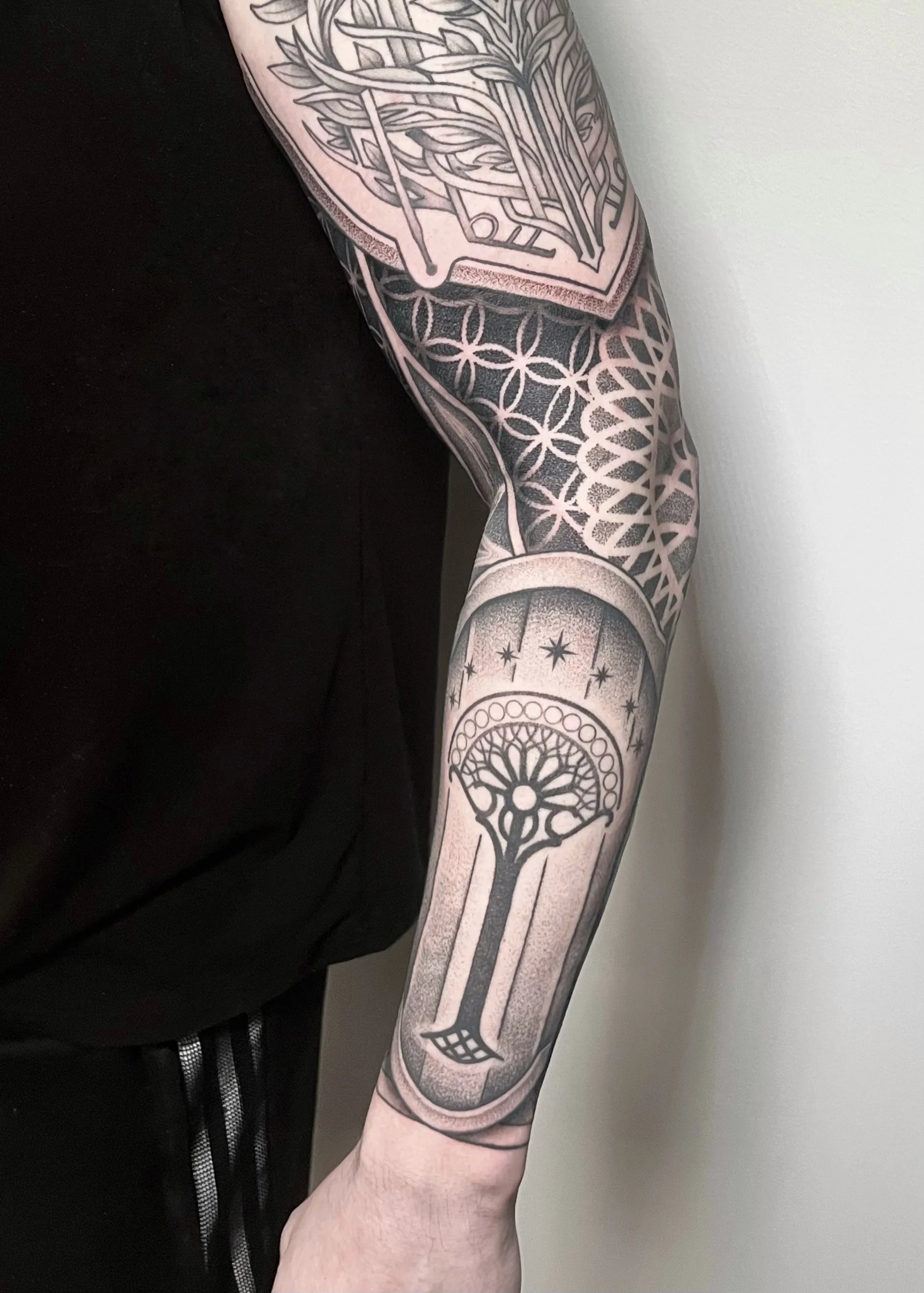 Geometric tattoo by Erin Manning: tree, stars, geometric pattern, nature