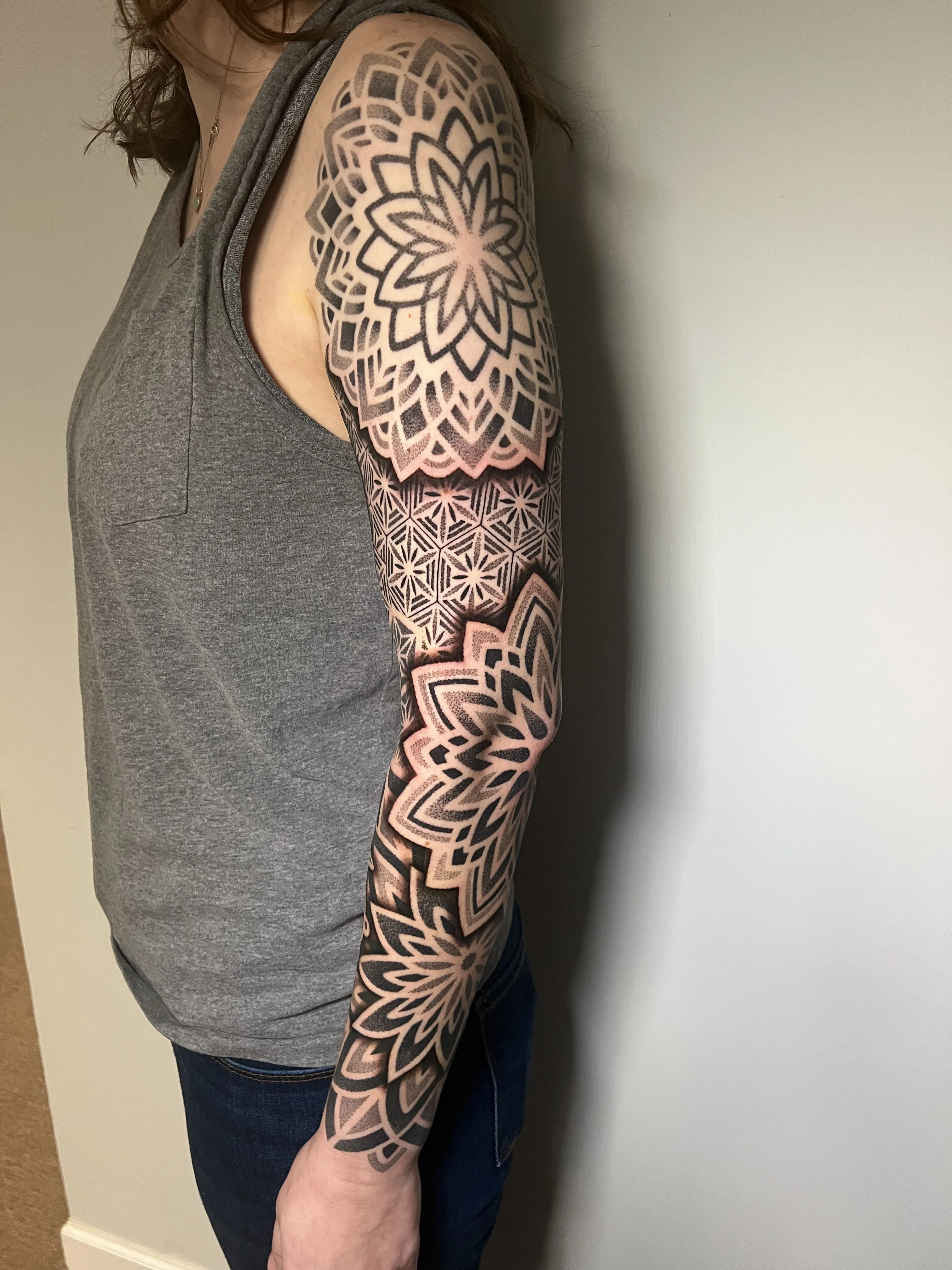 Geometric tattoo by Erin Manning: mandala, geometric pattern, flower, geometric
