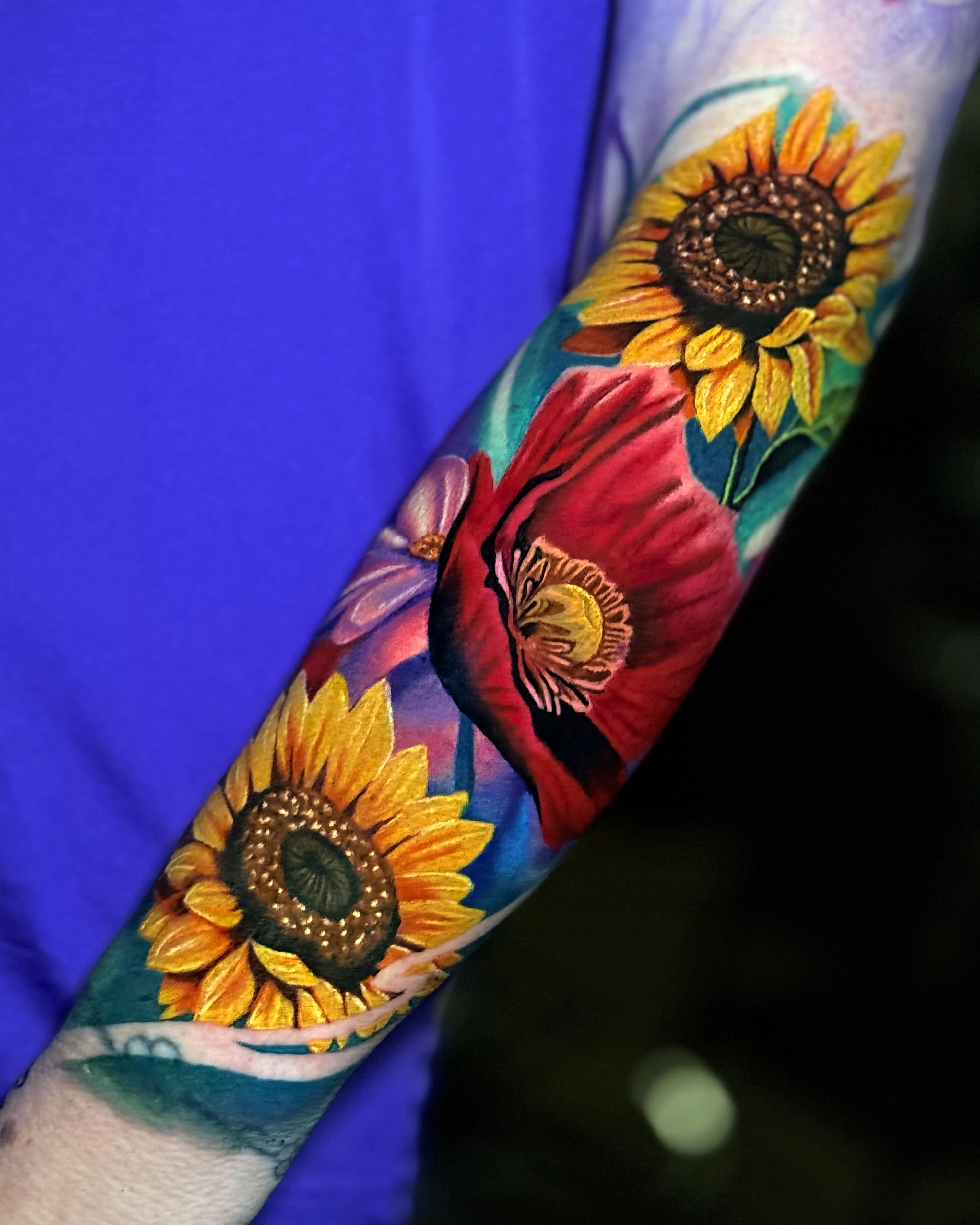 Color Realism tattoo by Umid Panahov: sunflower, poppy flower, purple flower, floral