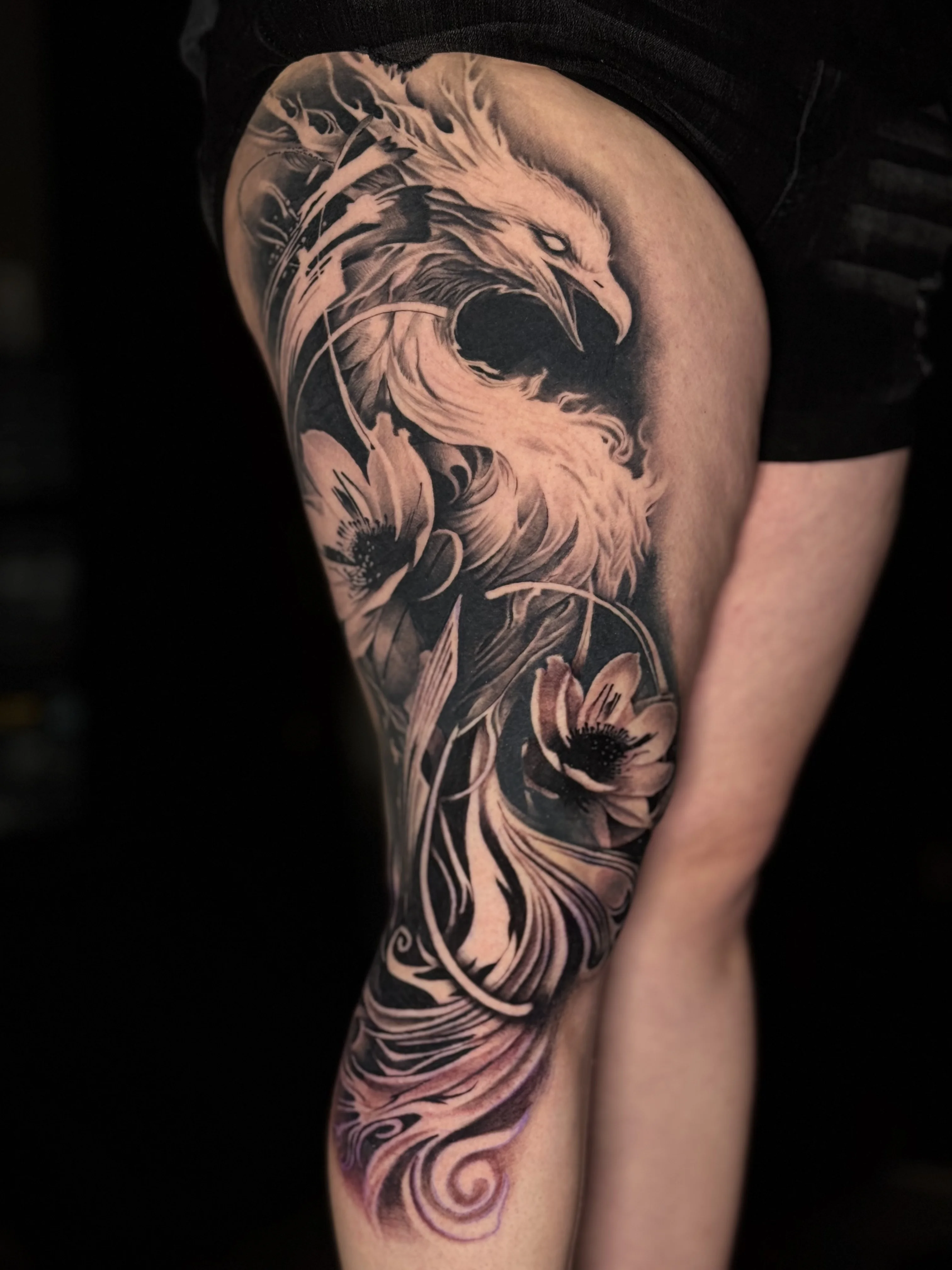 Black & Gray Realism tattoo by Umid Panahov: phoenix, flower, feathers, mythology