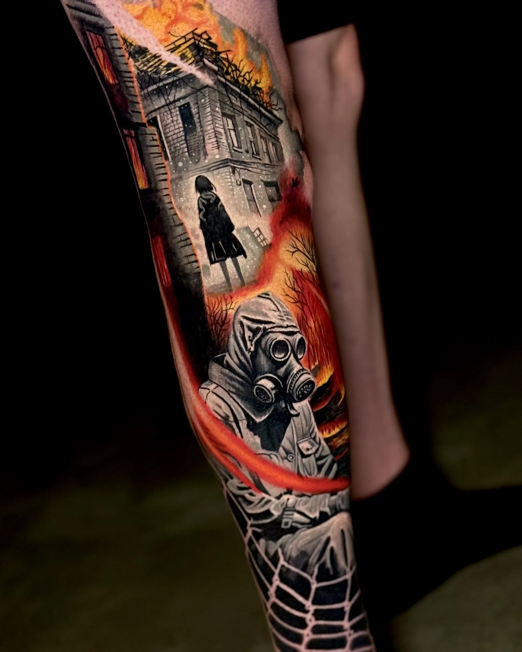 Color Realism tattoo by Umid Panahov: person in gas mask, burning building, person silhouette, fire