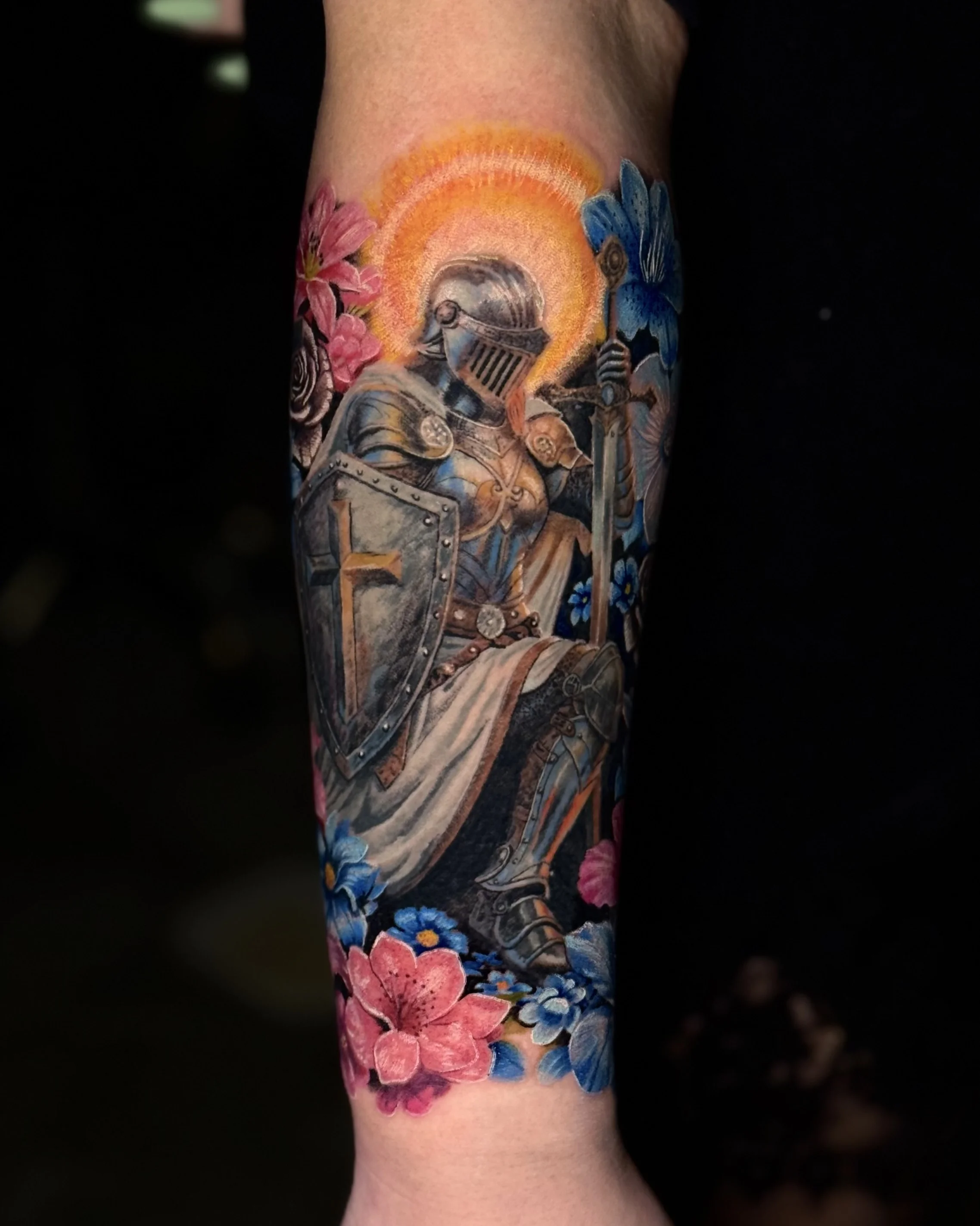 Color Realism tattoo by Umid Panahov: knight, sword, shield, flowers