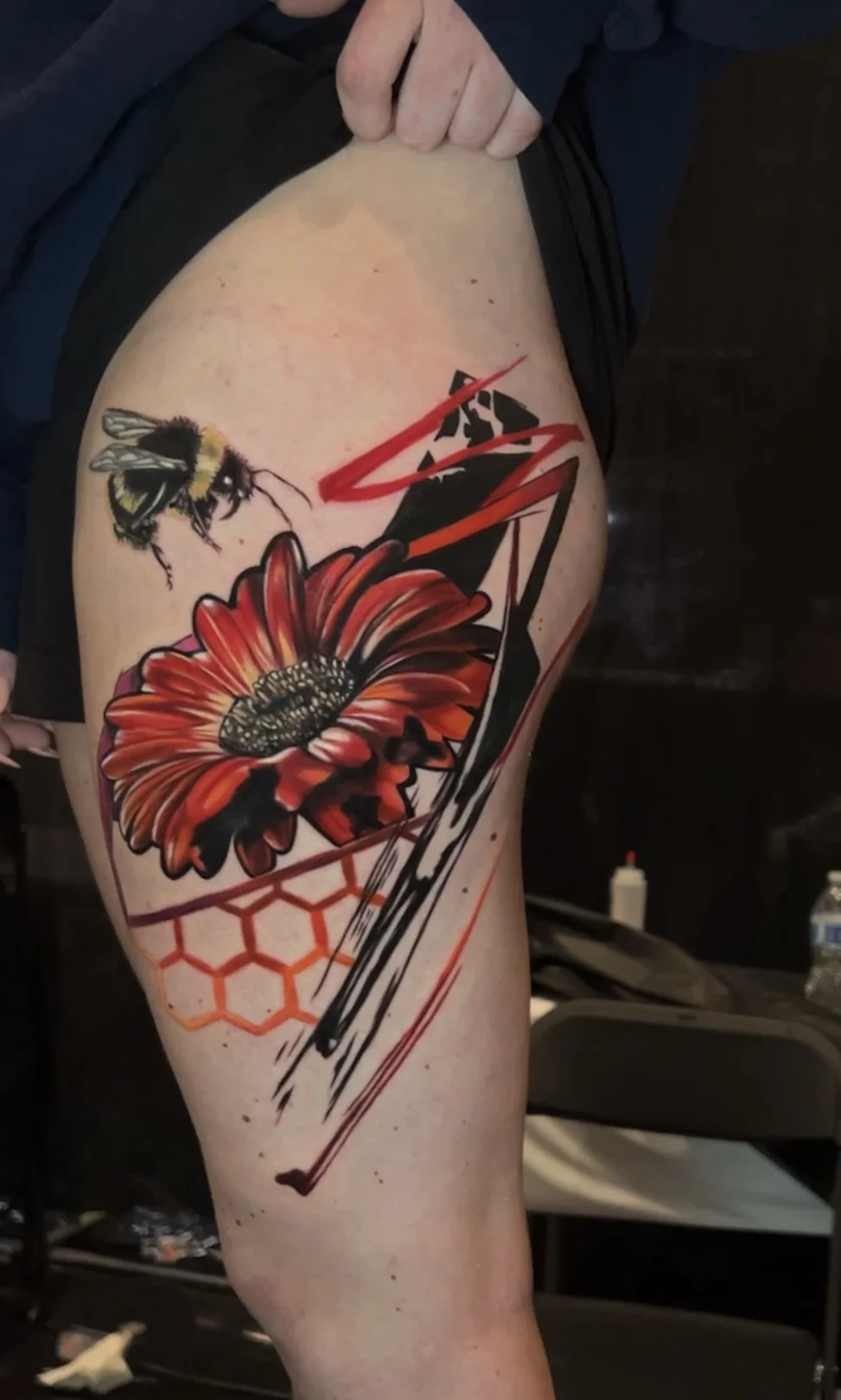Neo-Traditional tattoo by Pierre Bustos: bee, flower, honeycomb, nature