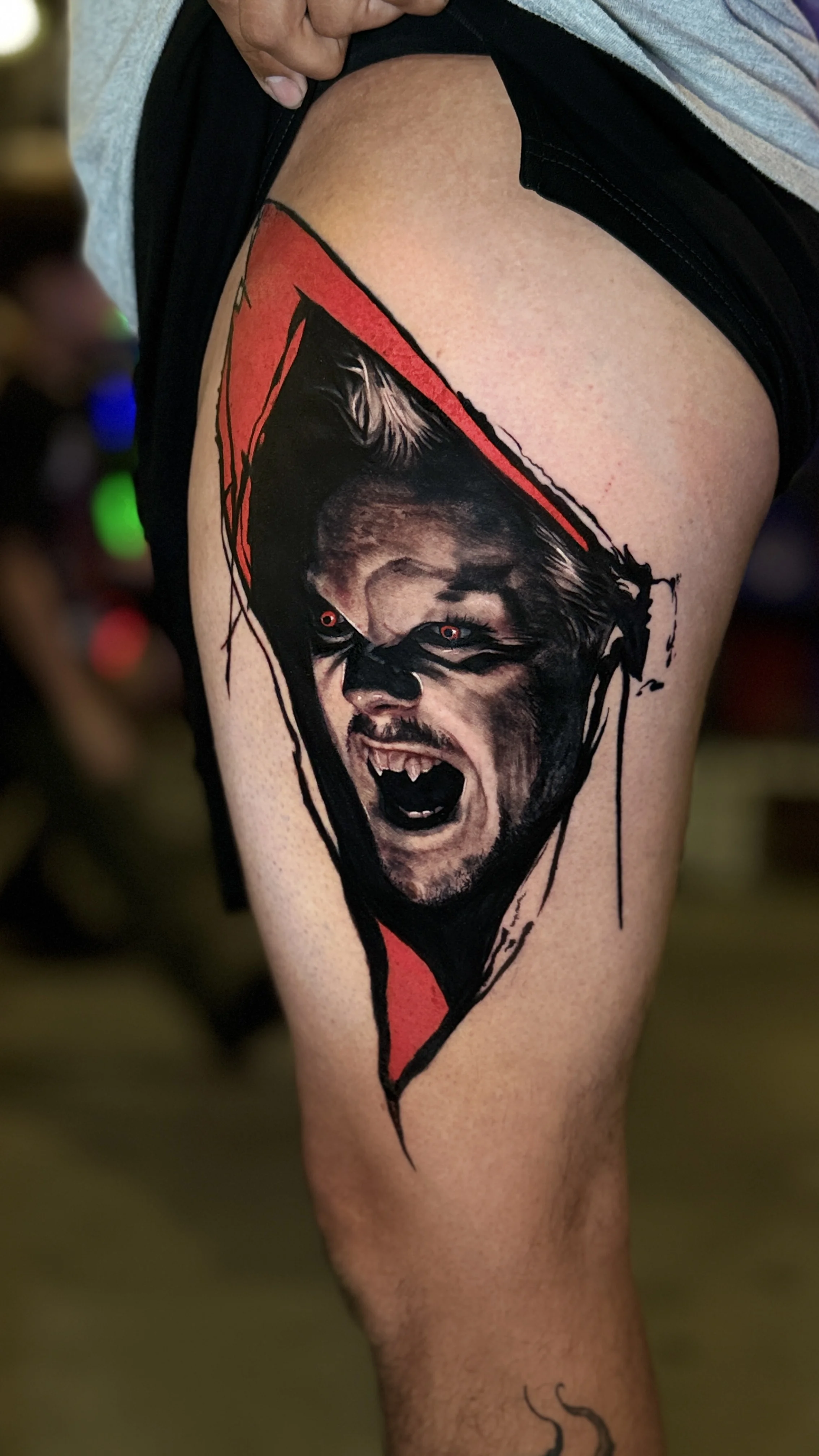 Black & Gray Realism tattoo by Pierre Bustos: vampire, face, fangs, red eyes