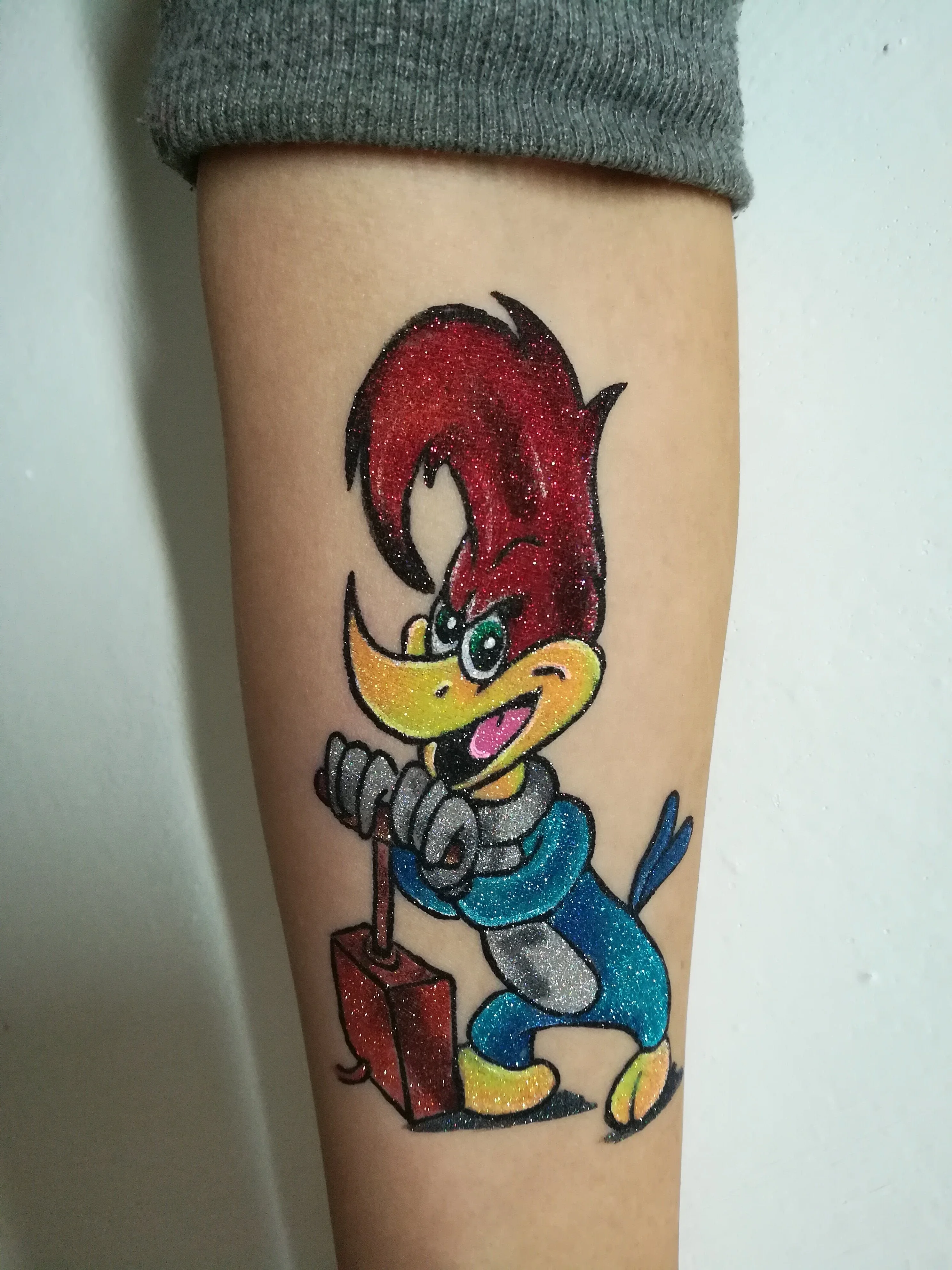 Custom Glitter Character Tattoo: glitter tattoo, glitter body art, temporary tattoo, temporary body art, custom design, color
