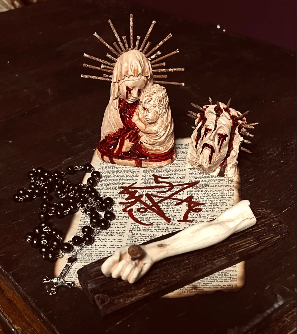 Surrealism tattoo by United Society of Sin: virgin mary, baby jesus, rosary, crown of thorns