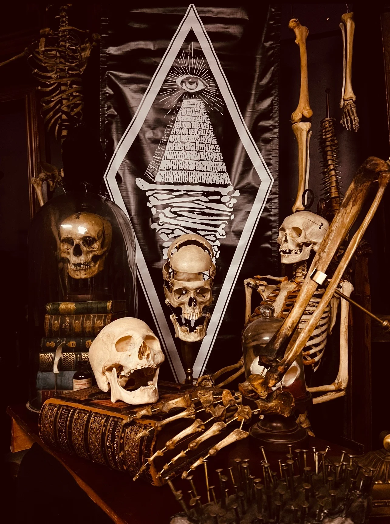 Black & Gray Realism tattoo by United Society of Sin: skull, skeleton, all seeing eye, books