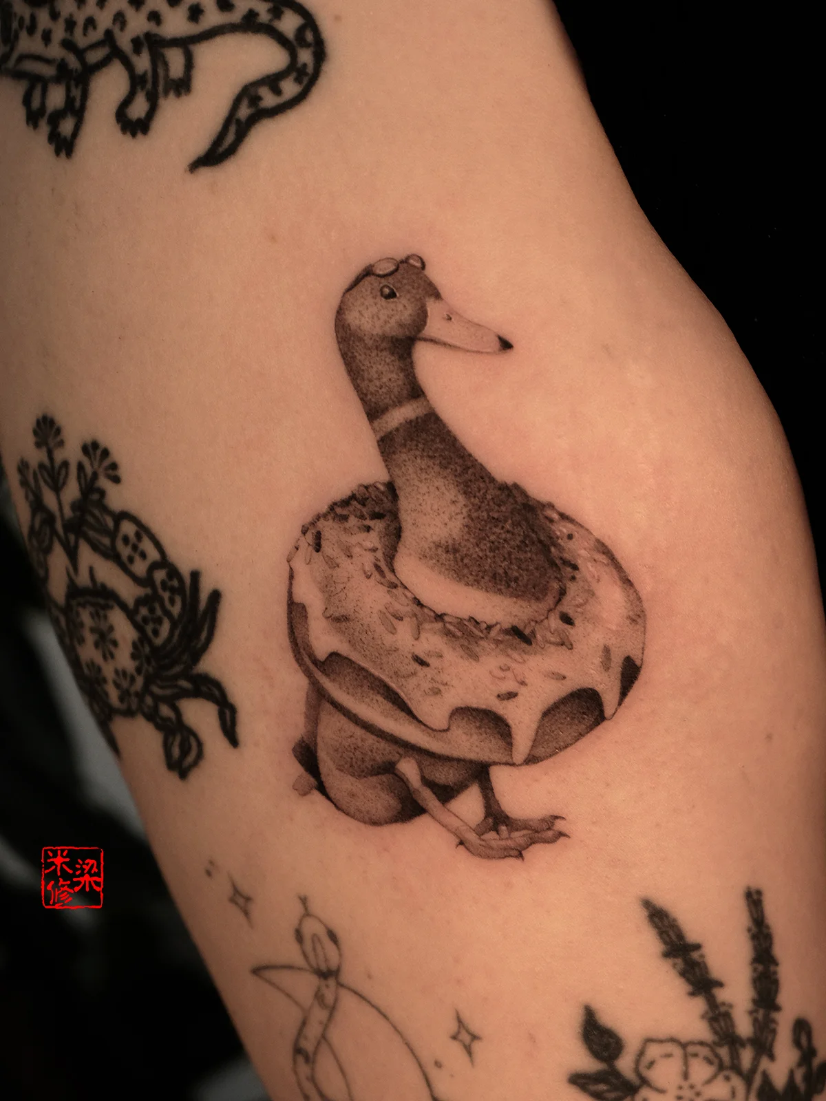Black & Gray Realism tattoo by Michelle.tatts: duck, swimsuit ring, animal, nature