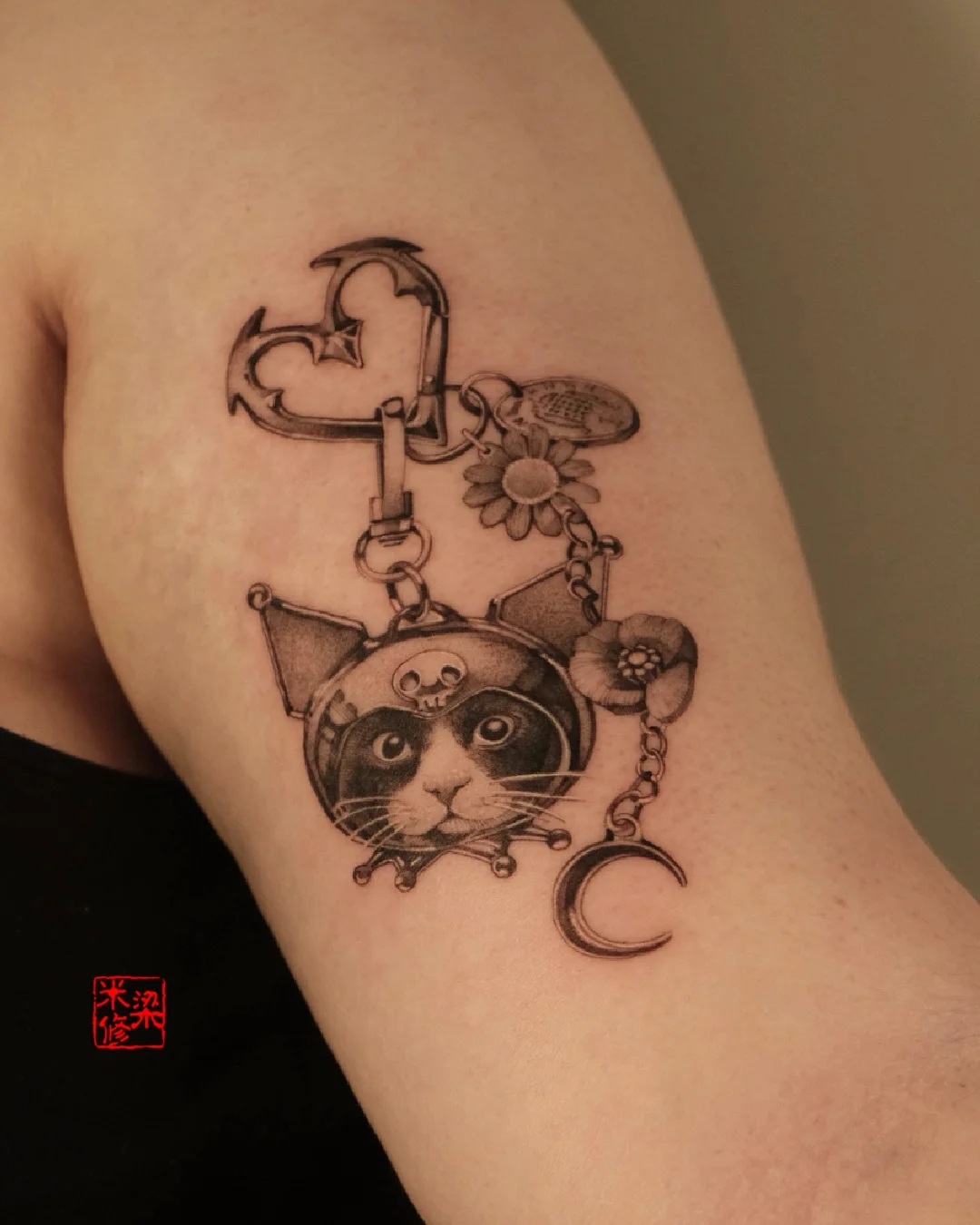 Realistic Cat in Helmet Upper Arm: cat, helmet, skull symbol, flower, crescent moon, keychain