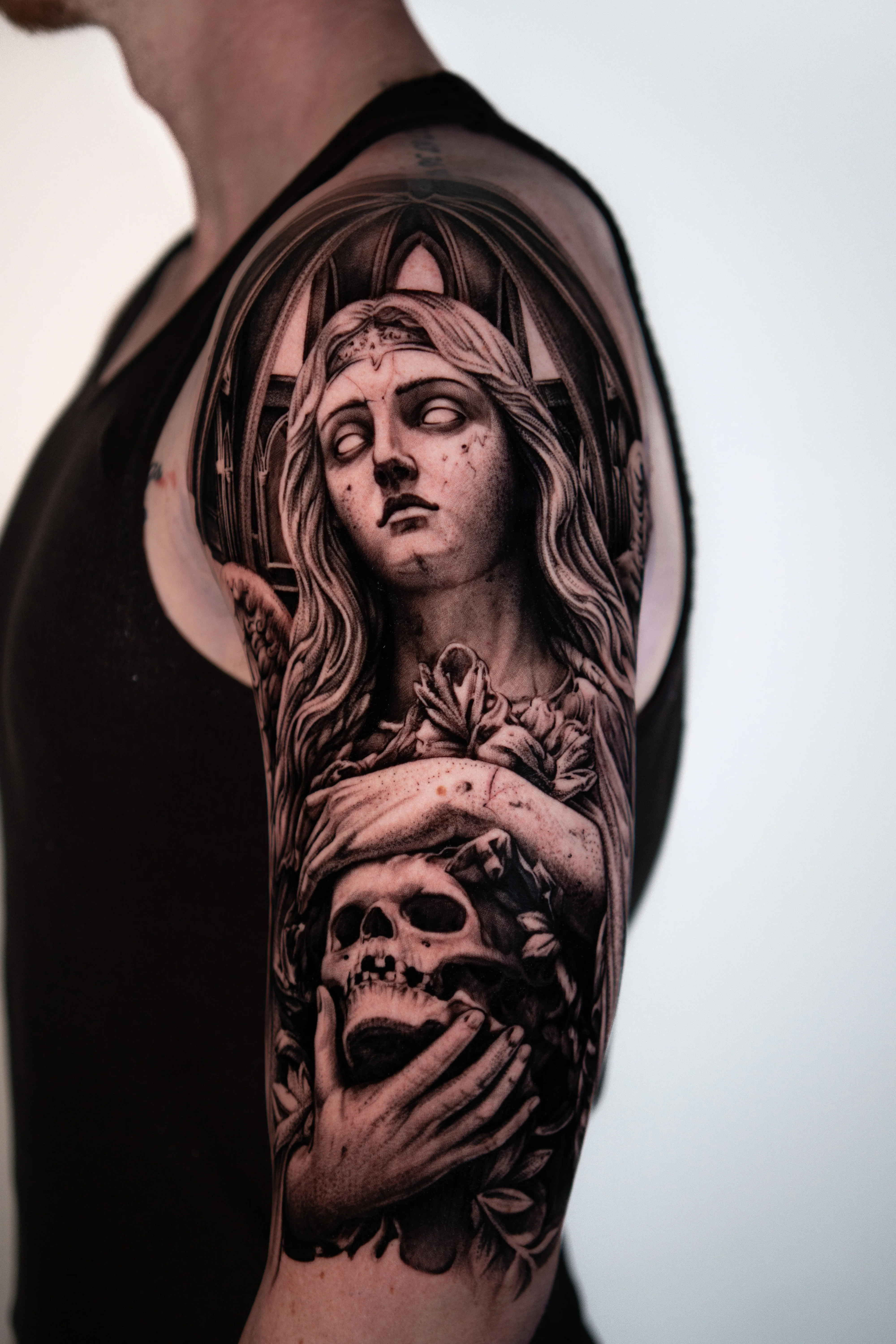 Black & Gray Realism tattoo by Do Santos: woman, skull, leaves, hands