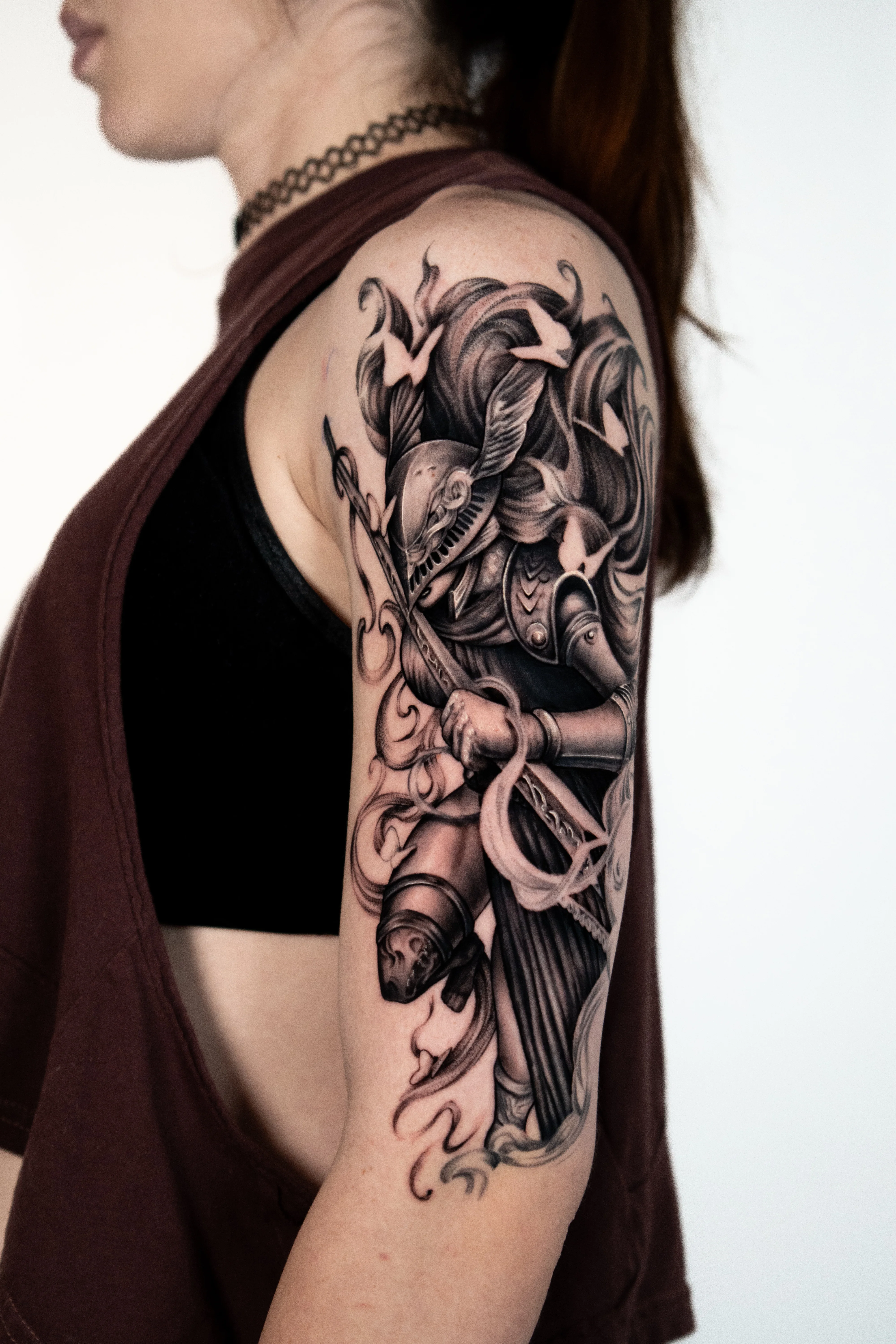 Armored Warrior Black & Grey Half Sleeve: armored warrior, helmet, spear, cloak, birds, mythology