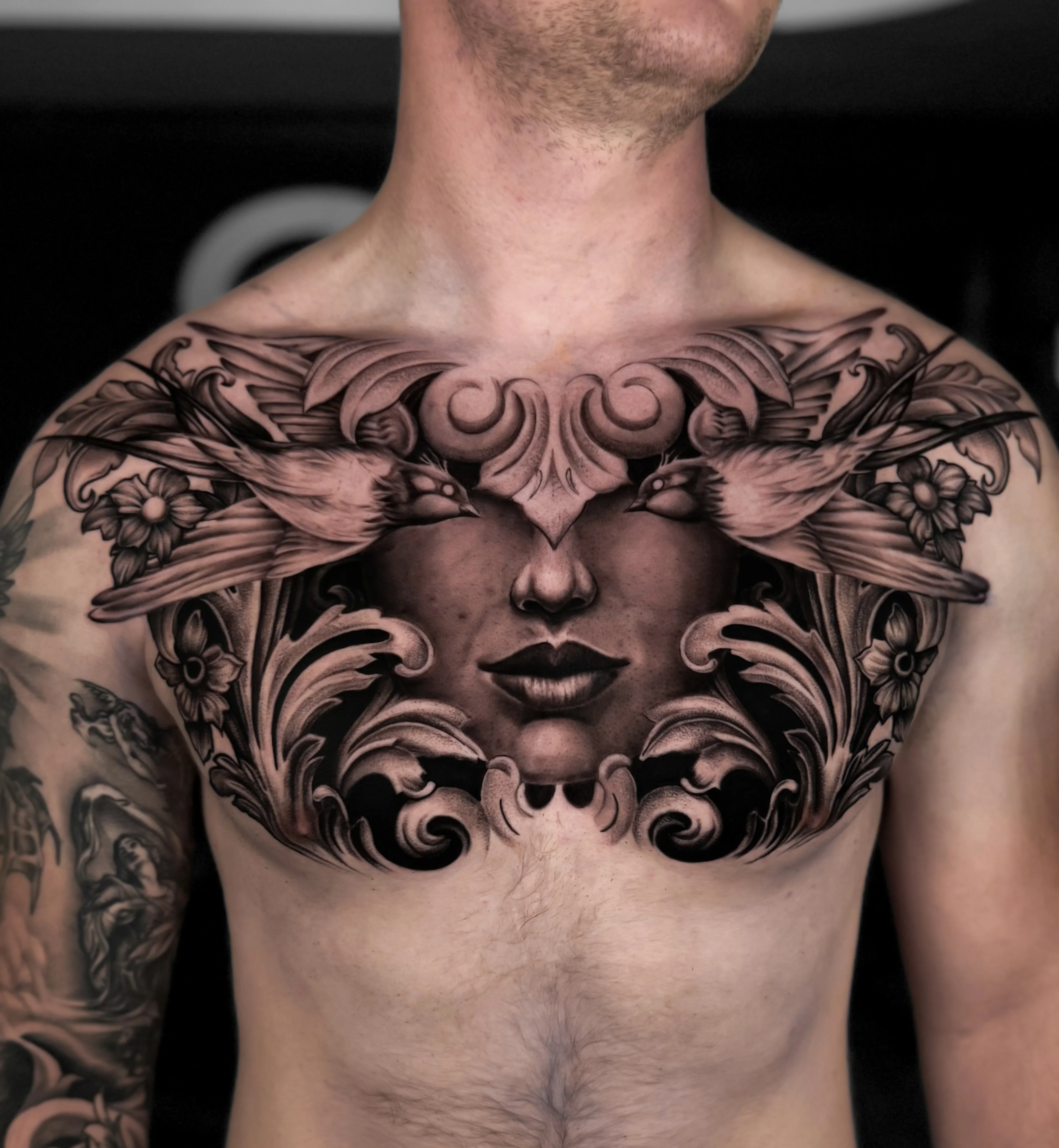 Black & Gray Realism tattoo by Do Santos: woman face, birds, floral elements, ornamental scrollwork