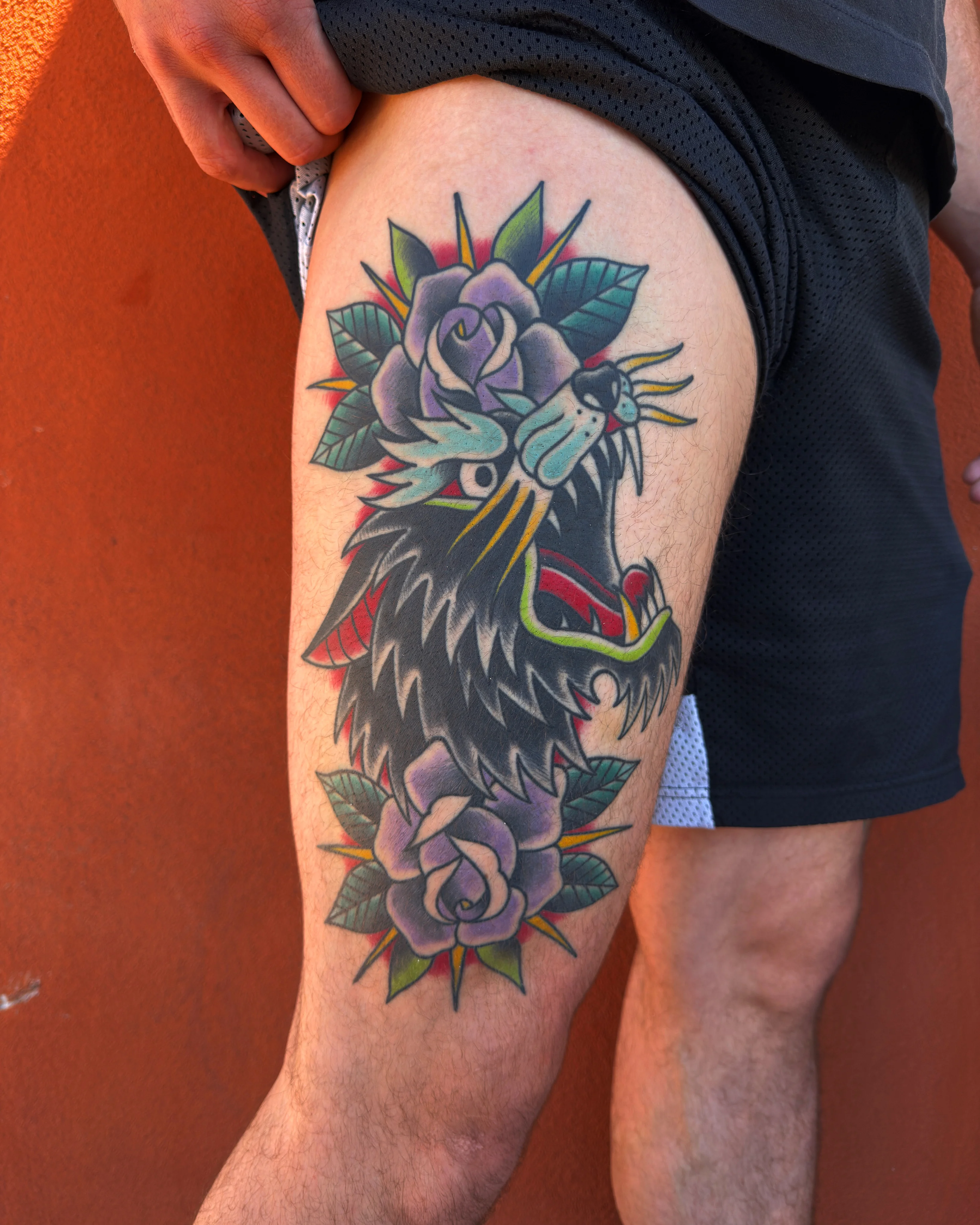 Traditional tattoo by Don Don: wolf, rose, leaf, animal